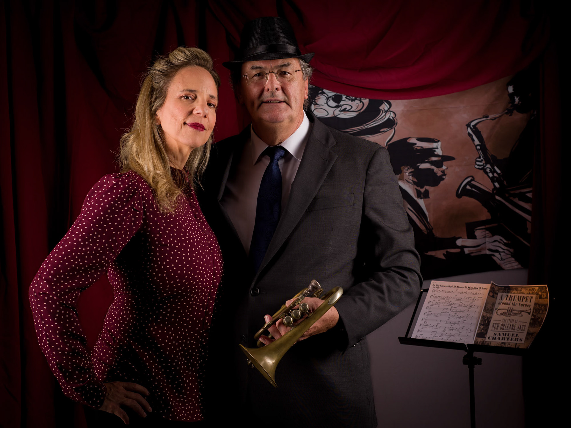 A couple enjoying a Jazz Theme Event. Photo in a studio like environment.