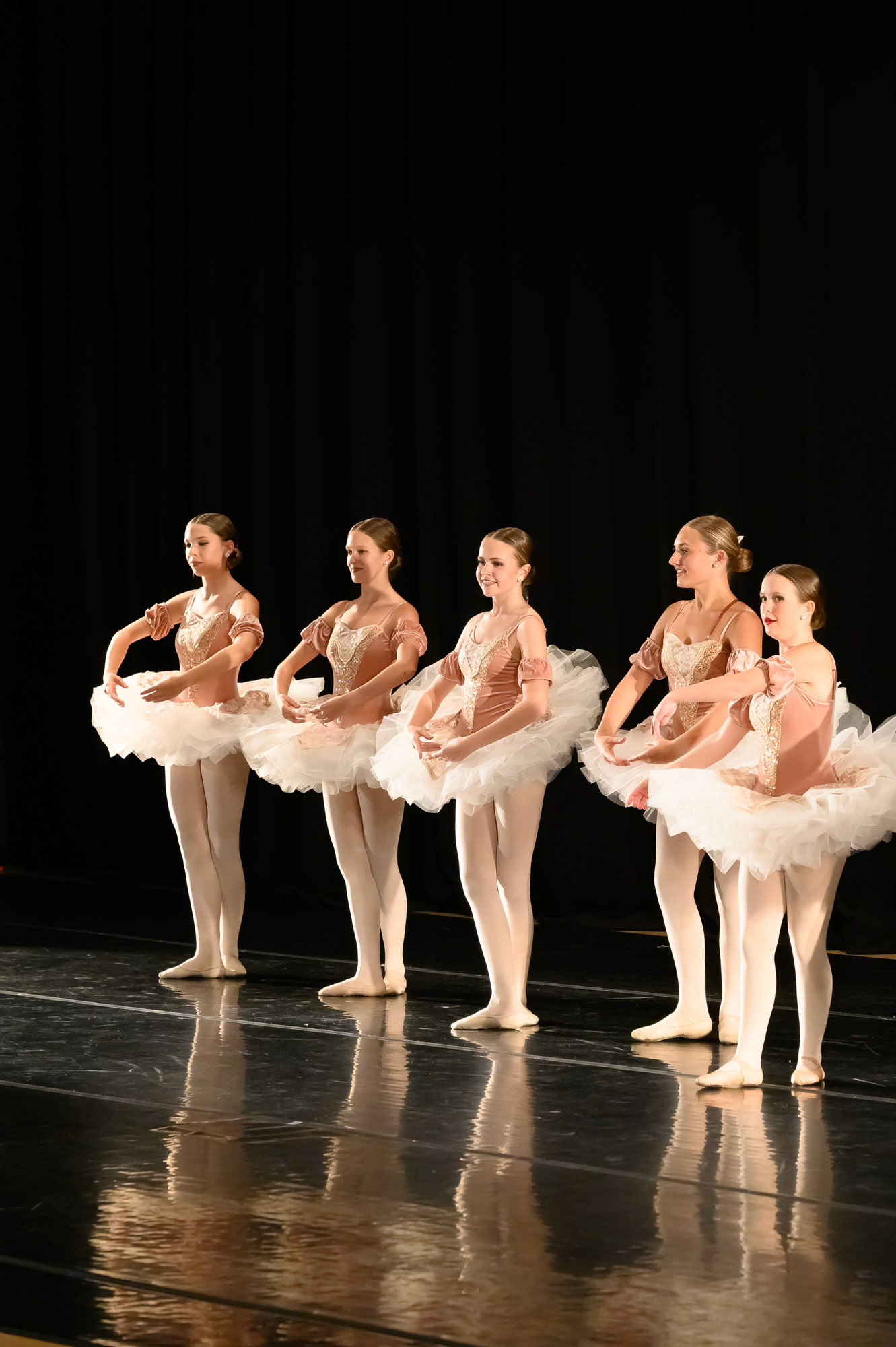 Teanage dancer in a group on stage for a Recital