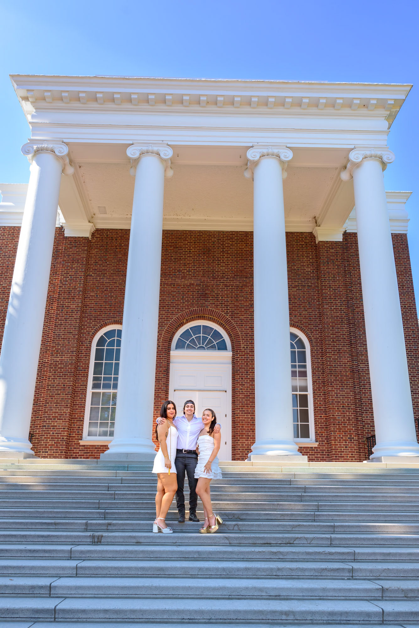 Graduation photo of a femal college student and her friends
