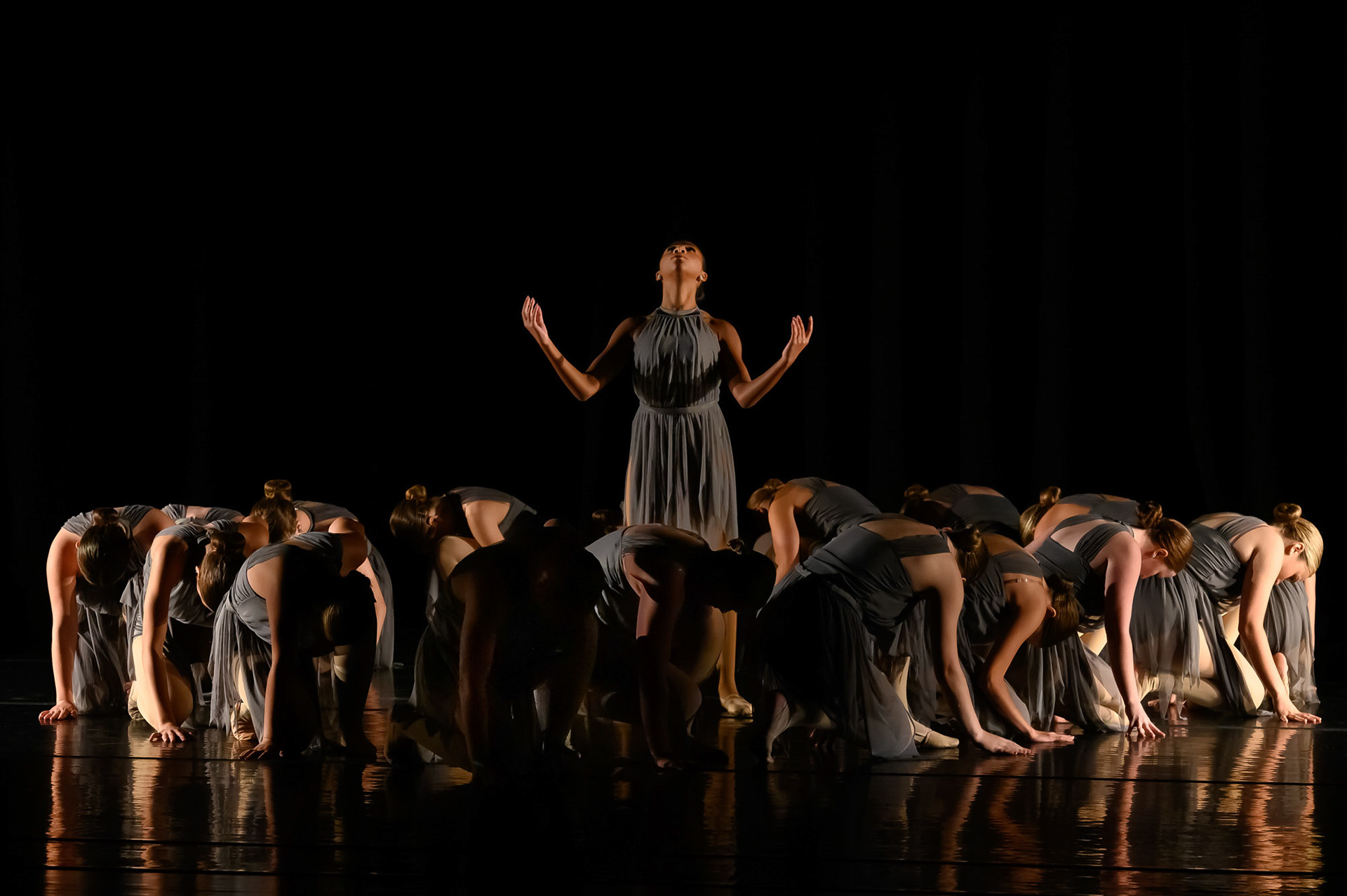 Teanage dancer in a group on stage for a Recital