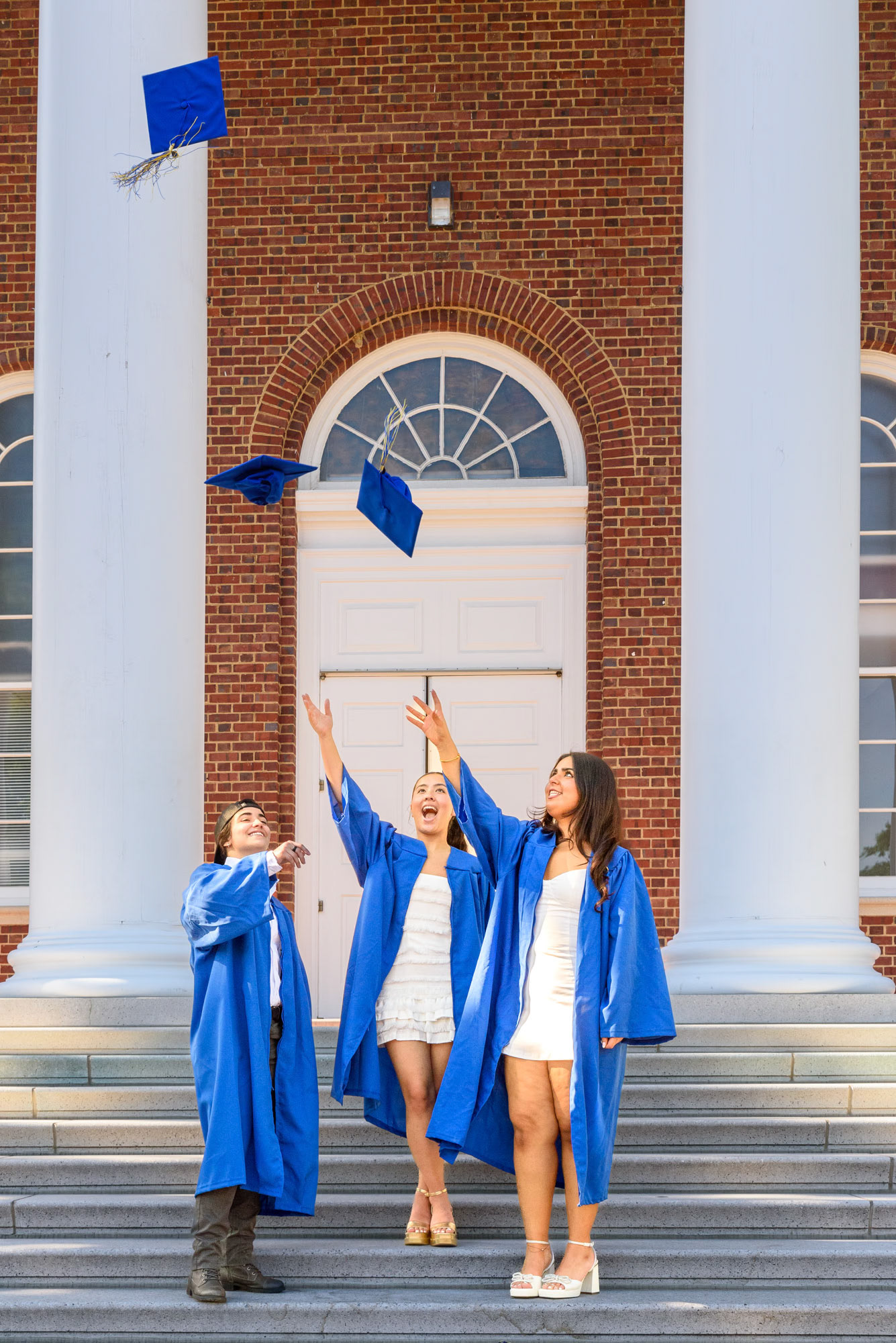 Graduation photo of a femal college student and her friends