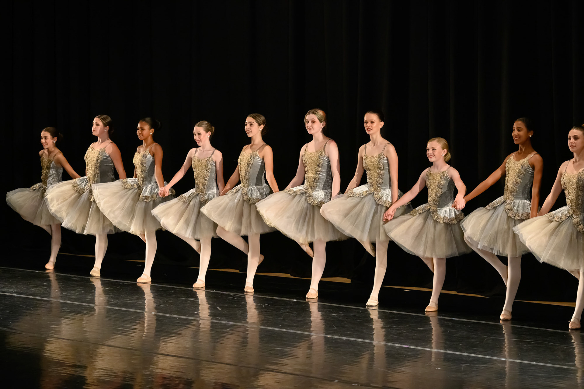 Teanage dancer in a group on stage for a Recital