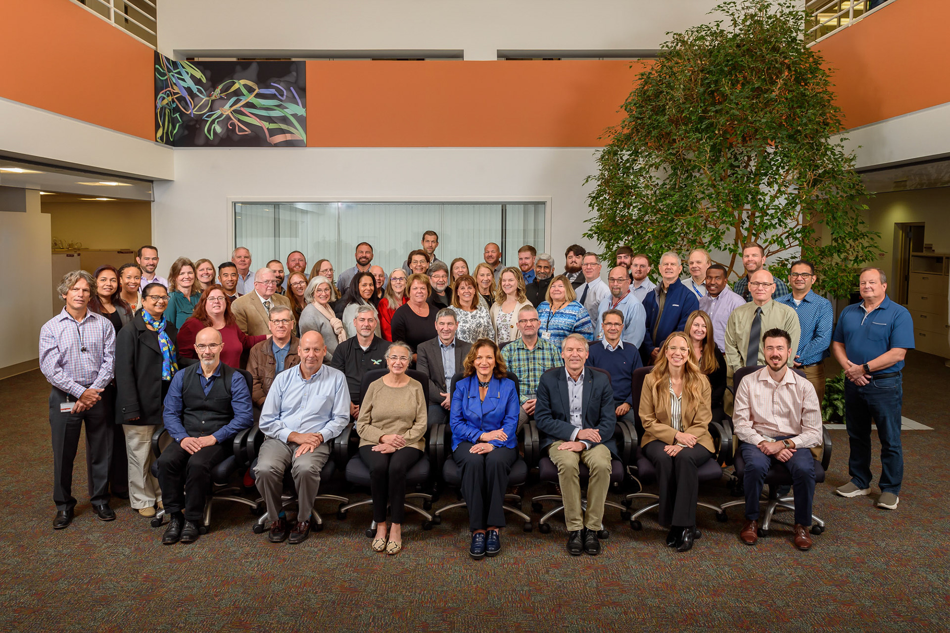 Group photo of VPs, Directors, Managers during a corporate event