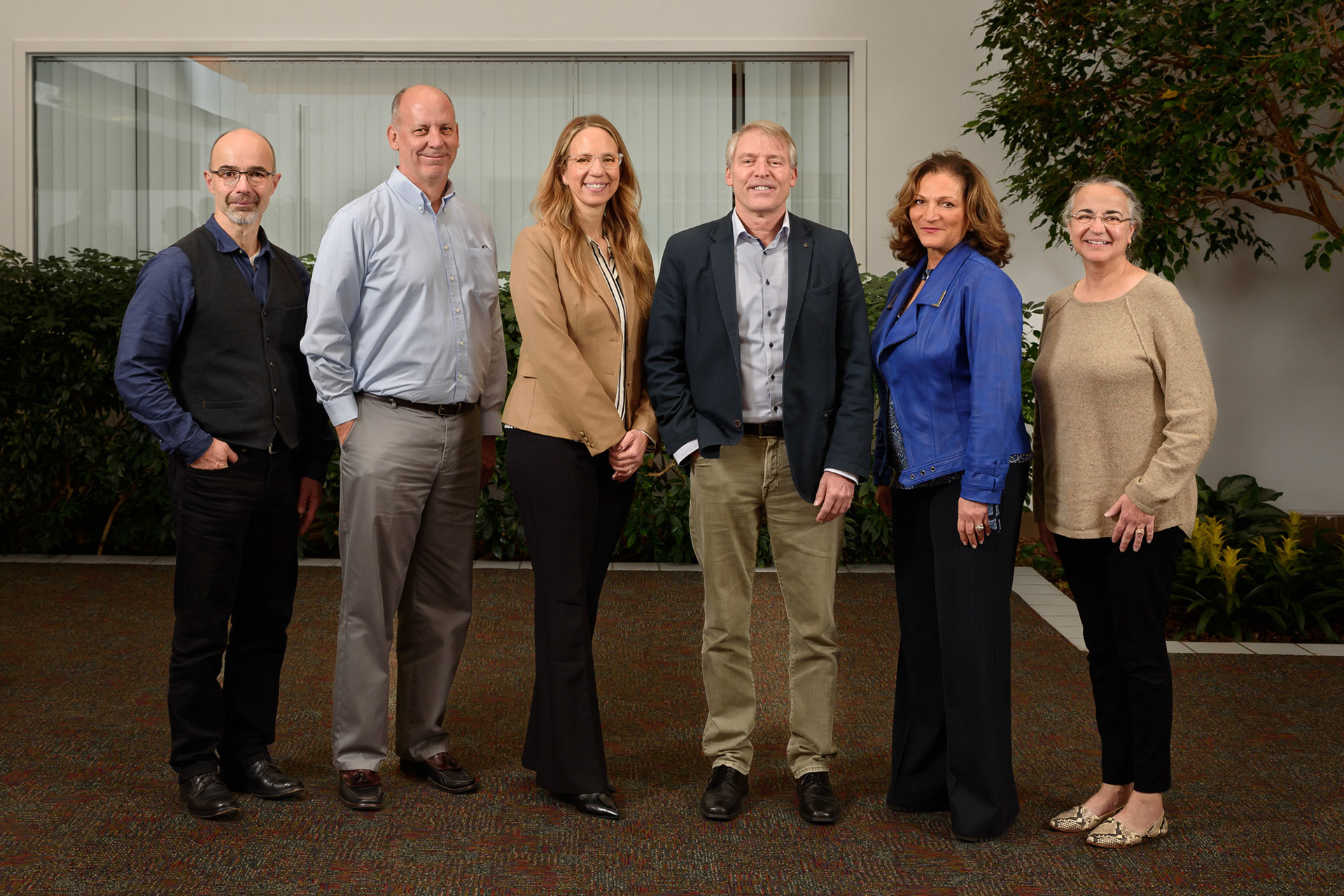 Group photo of VPs, Directors during a corporate event