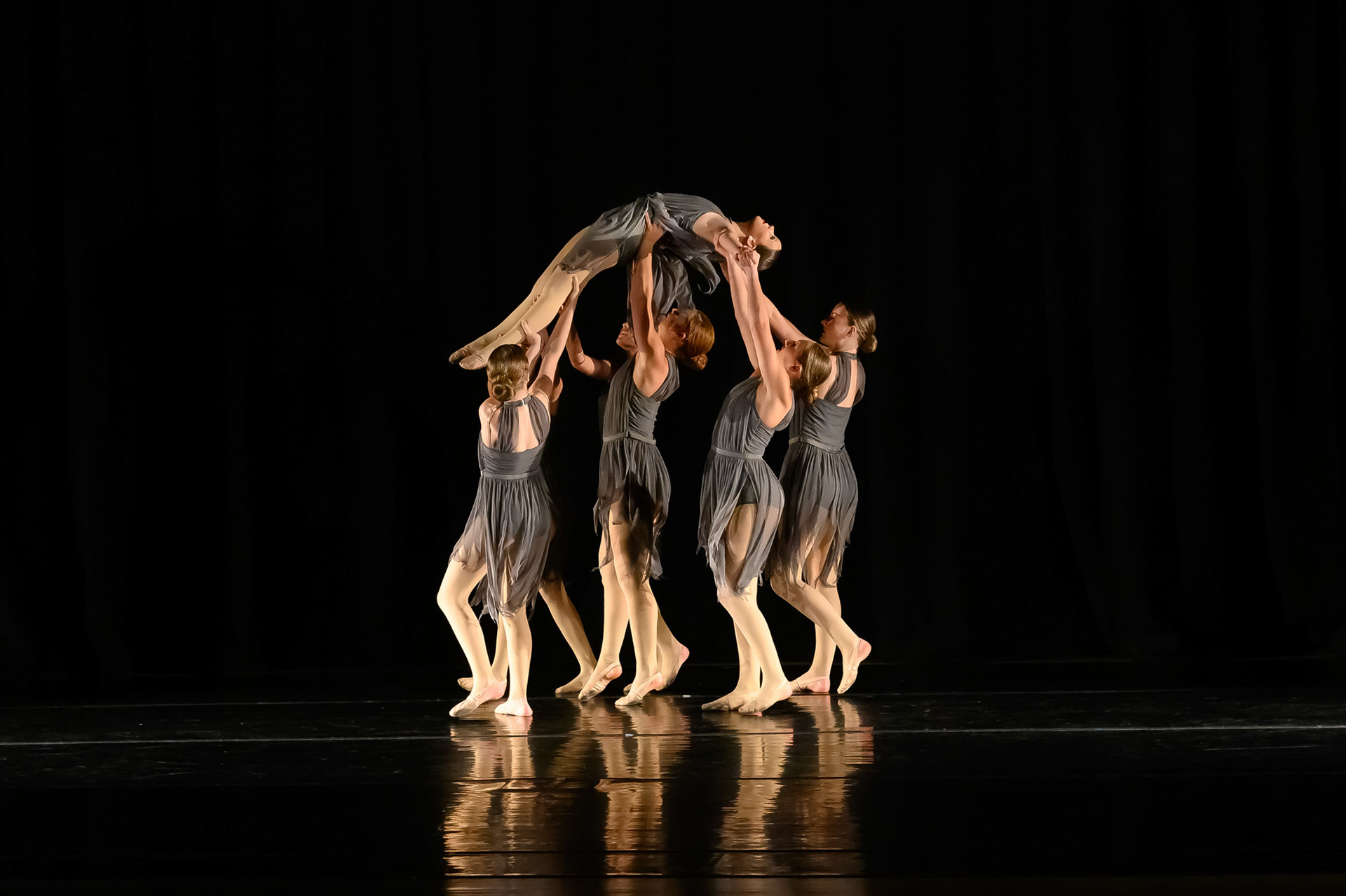 Teanage dancer in a group on stage for a Recital