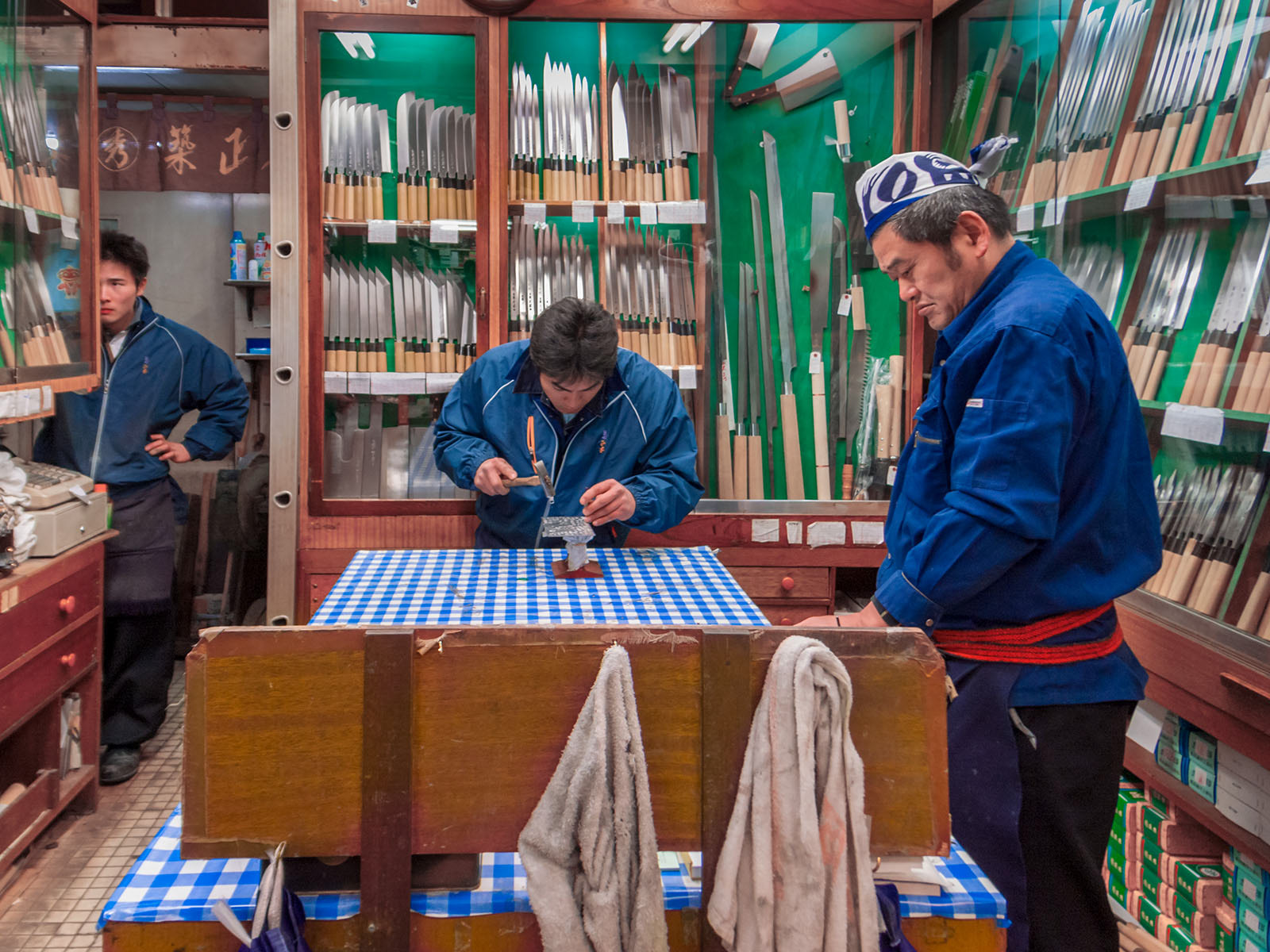 Knife makers at Tsukiji fish market, Tokyo