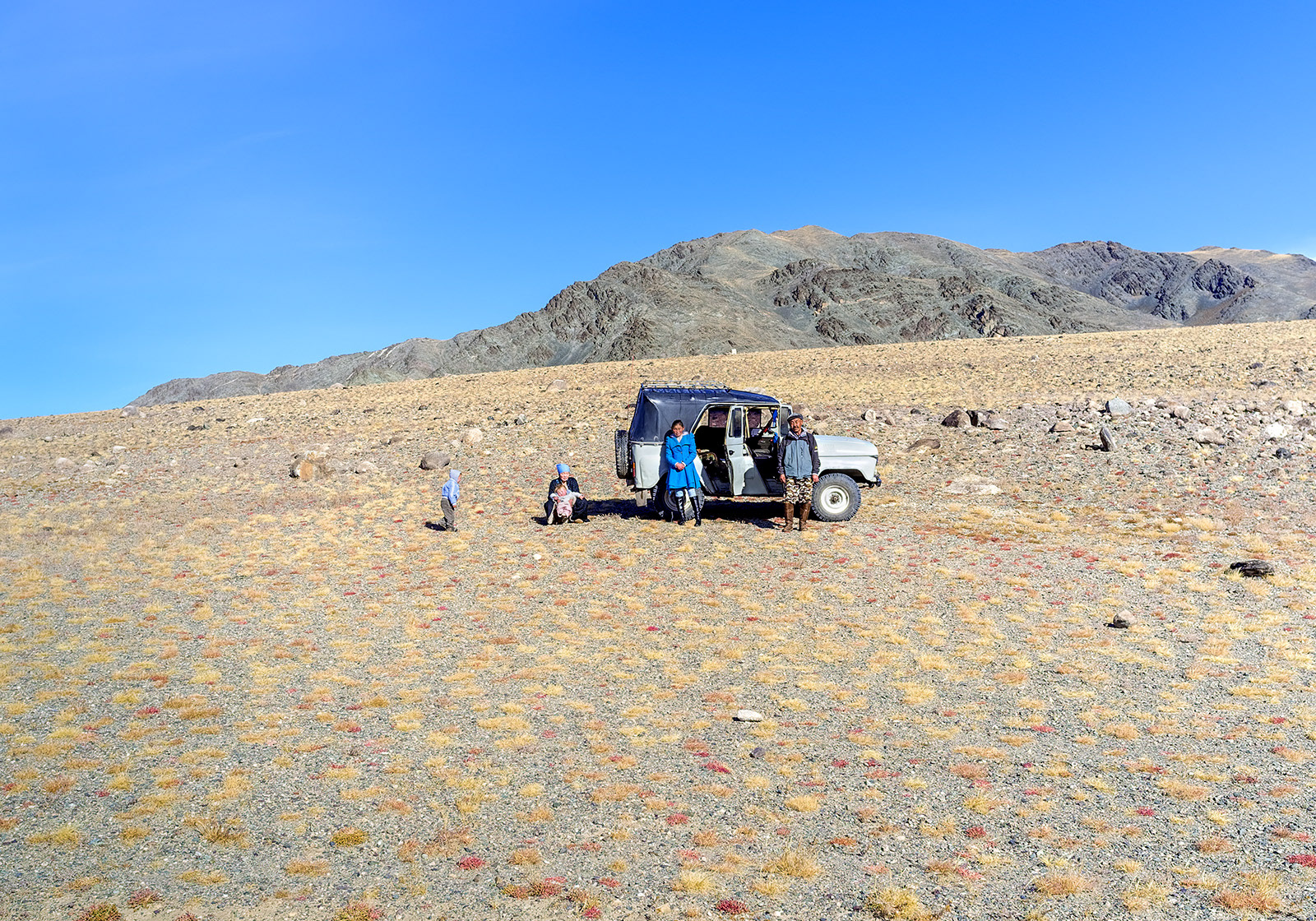 Family on the road in Western Mongolia