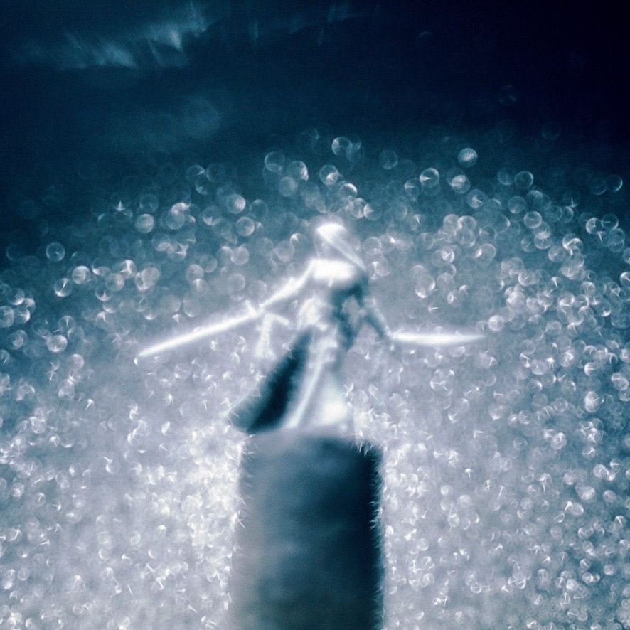 35mm under black light with extended exposure.