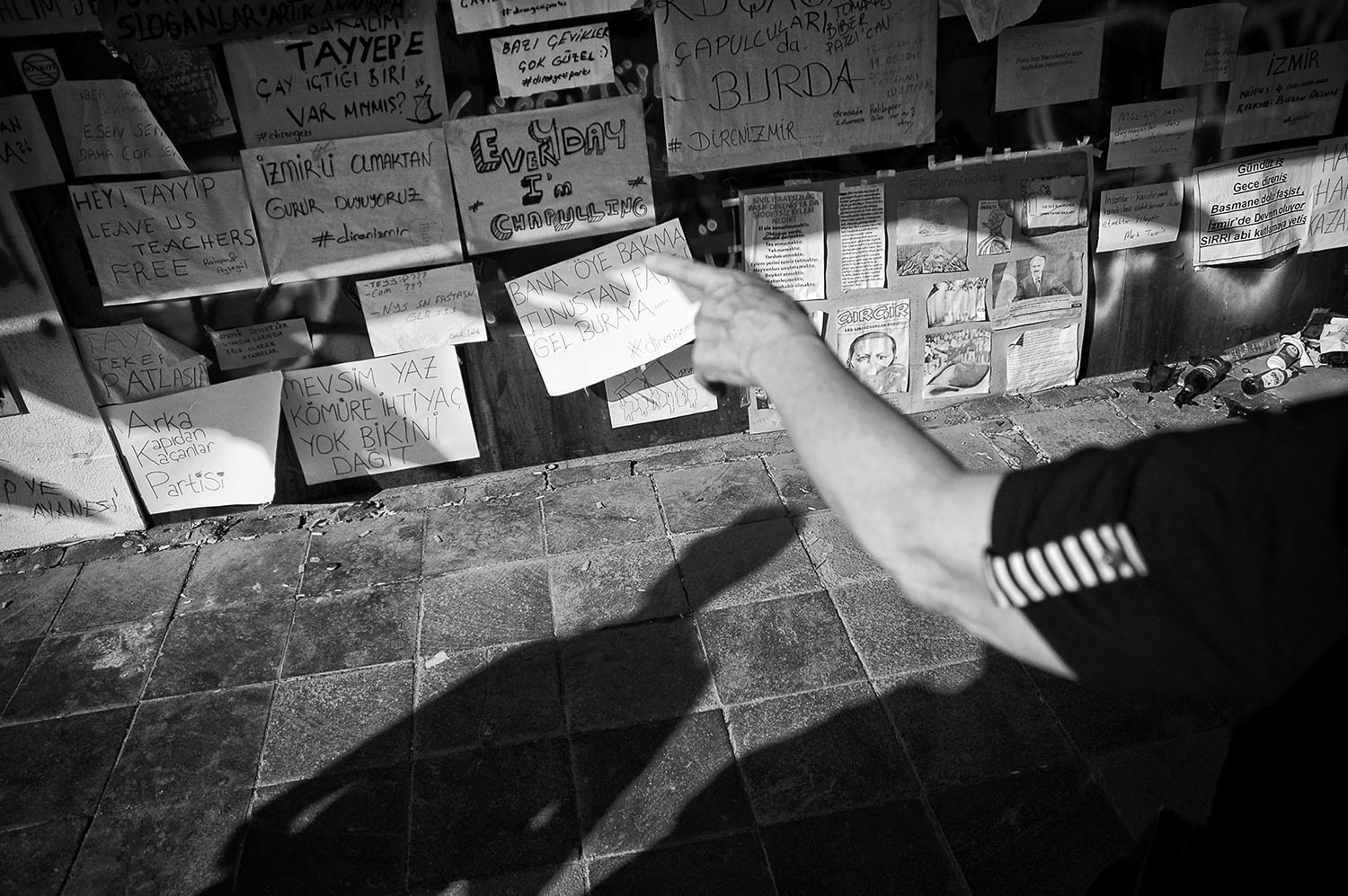 Posters on the walls of shops in Alsancak area depicting political messages and anti government drawings.