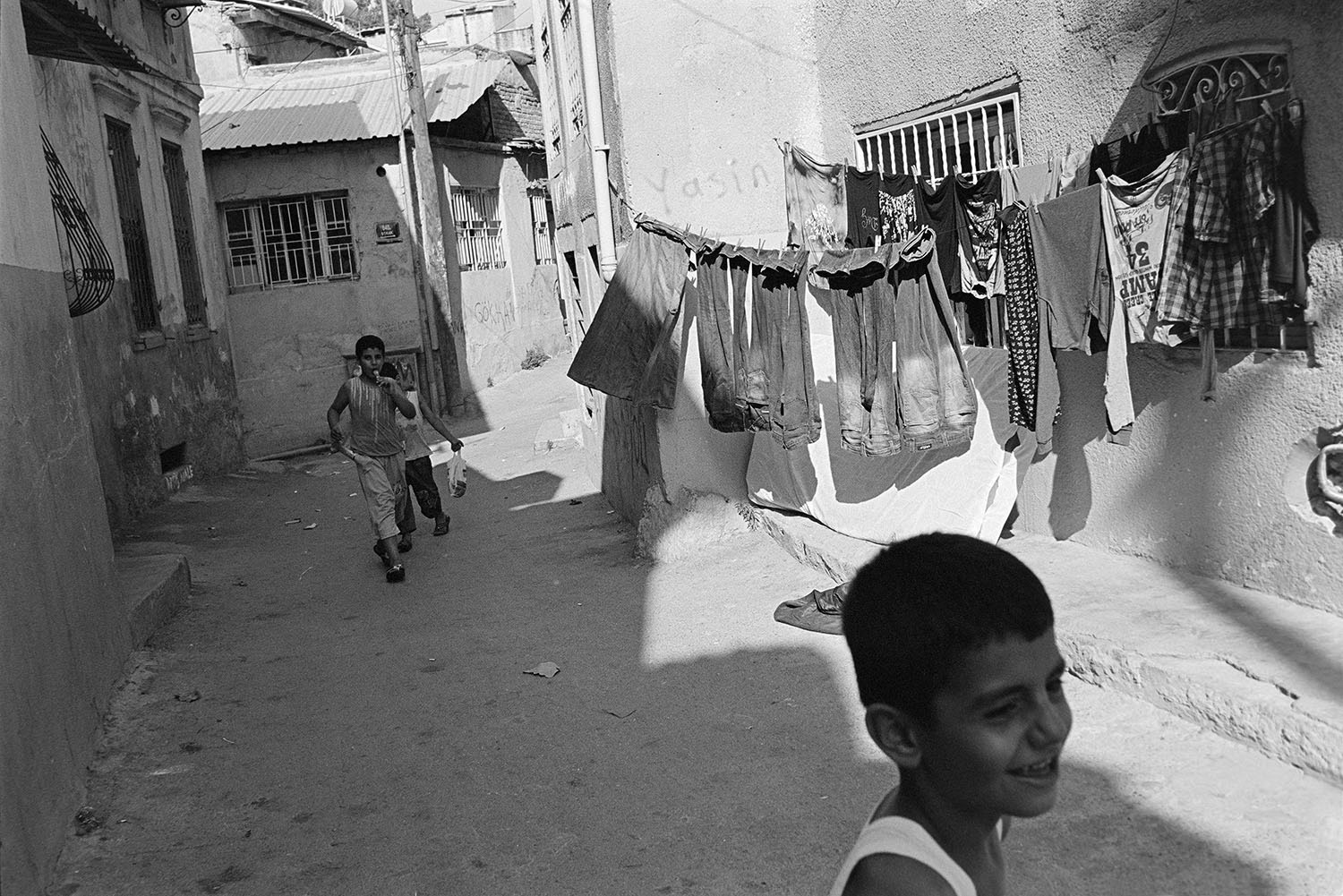 Kids playing on the streets of Kadıfekale in İzmir, Türkiye.