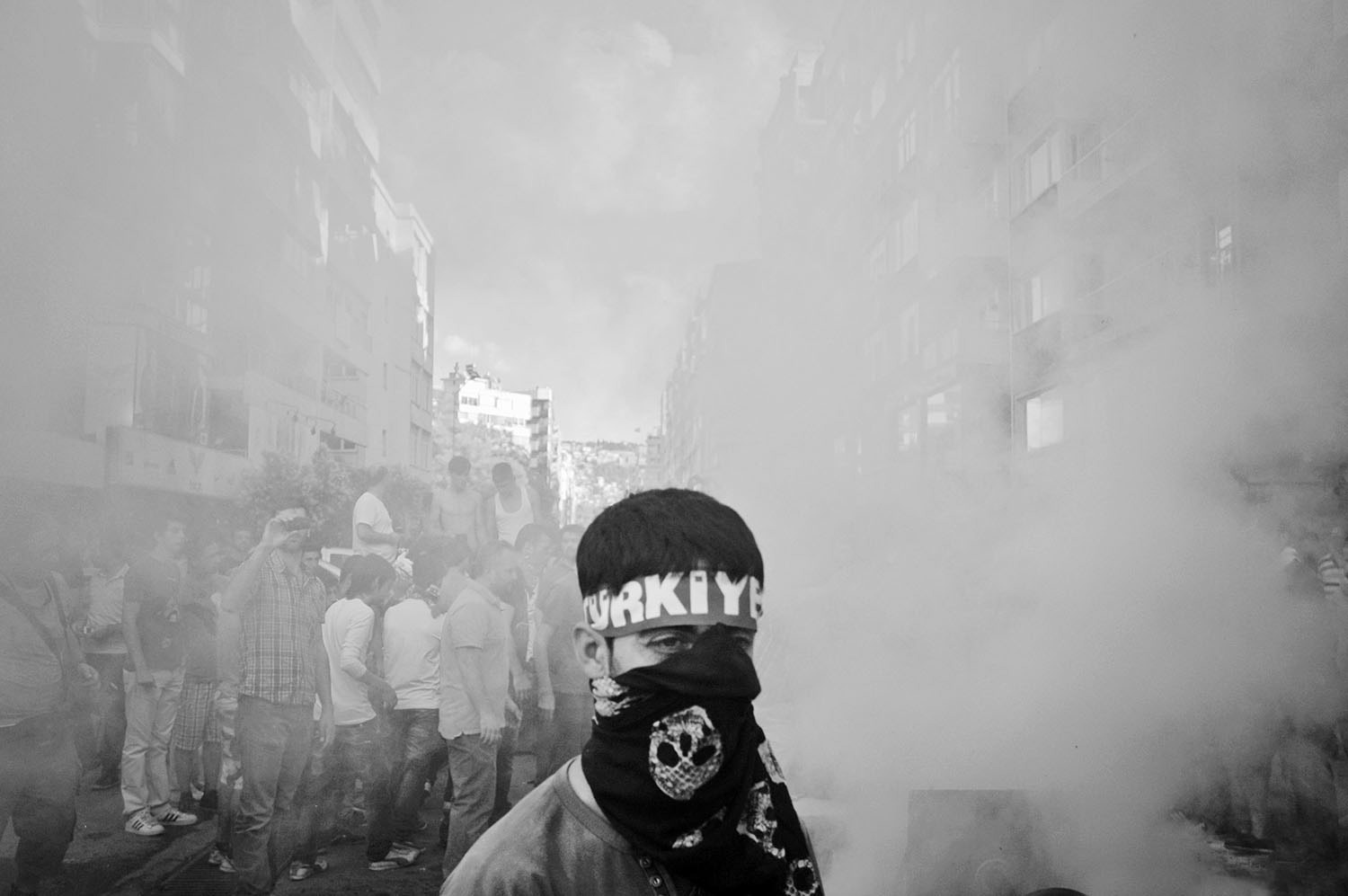 Smoke from burned materials during the protests make it difficult to see and breathe.