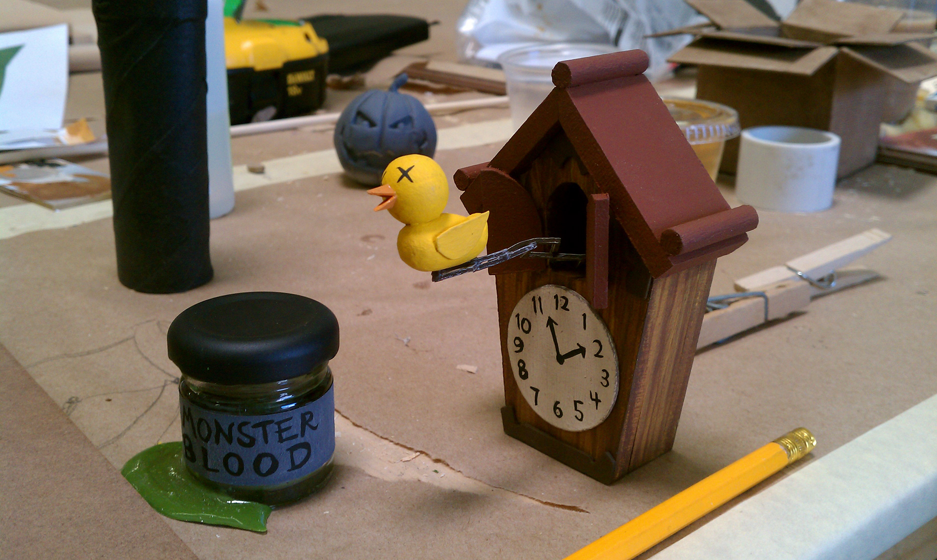Final cuckoo bird placement on clock. Final paint for monster blood label. S1, E8 Video Games.