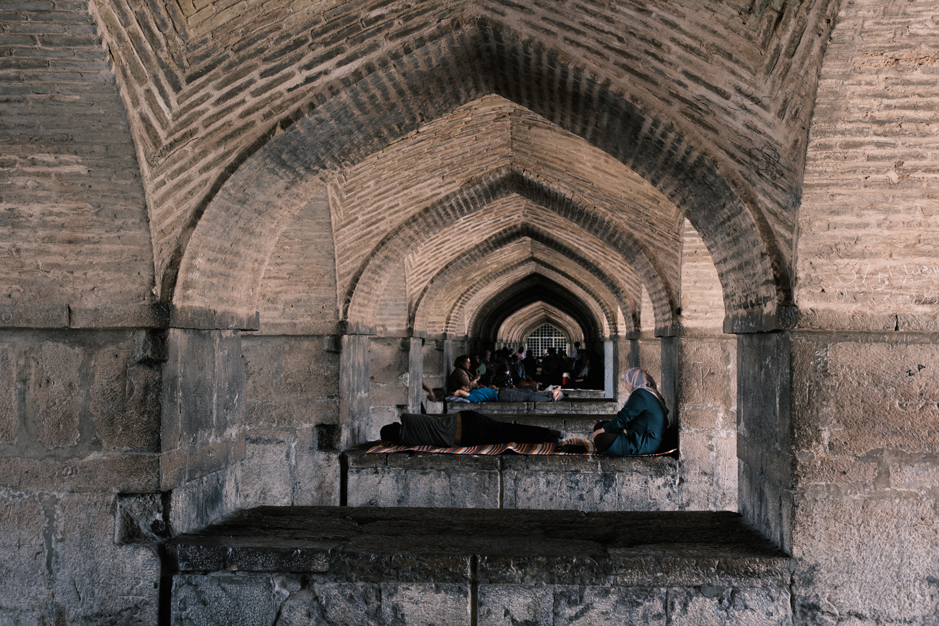 Listening to Persian songs under the Khajoo Bridge