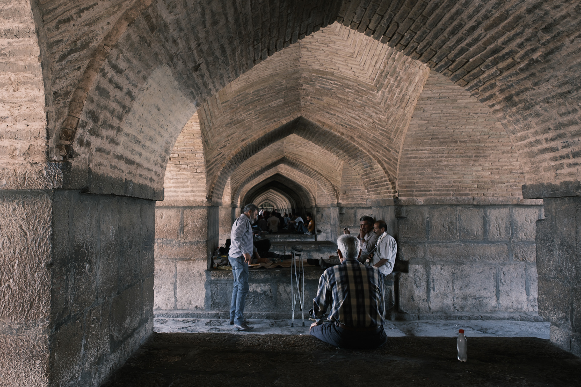 Listening to Persian songs under the Khajoo Bridge