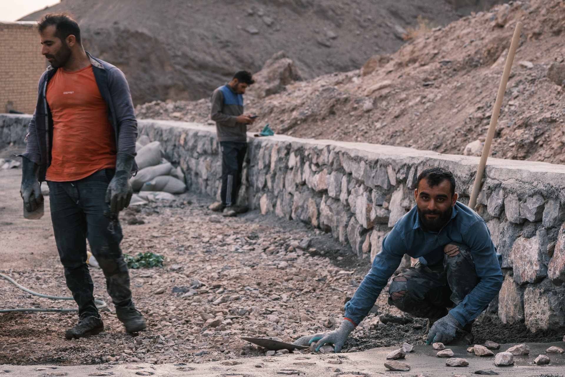 Afghan workers near Chak-Chak Shrine