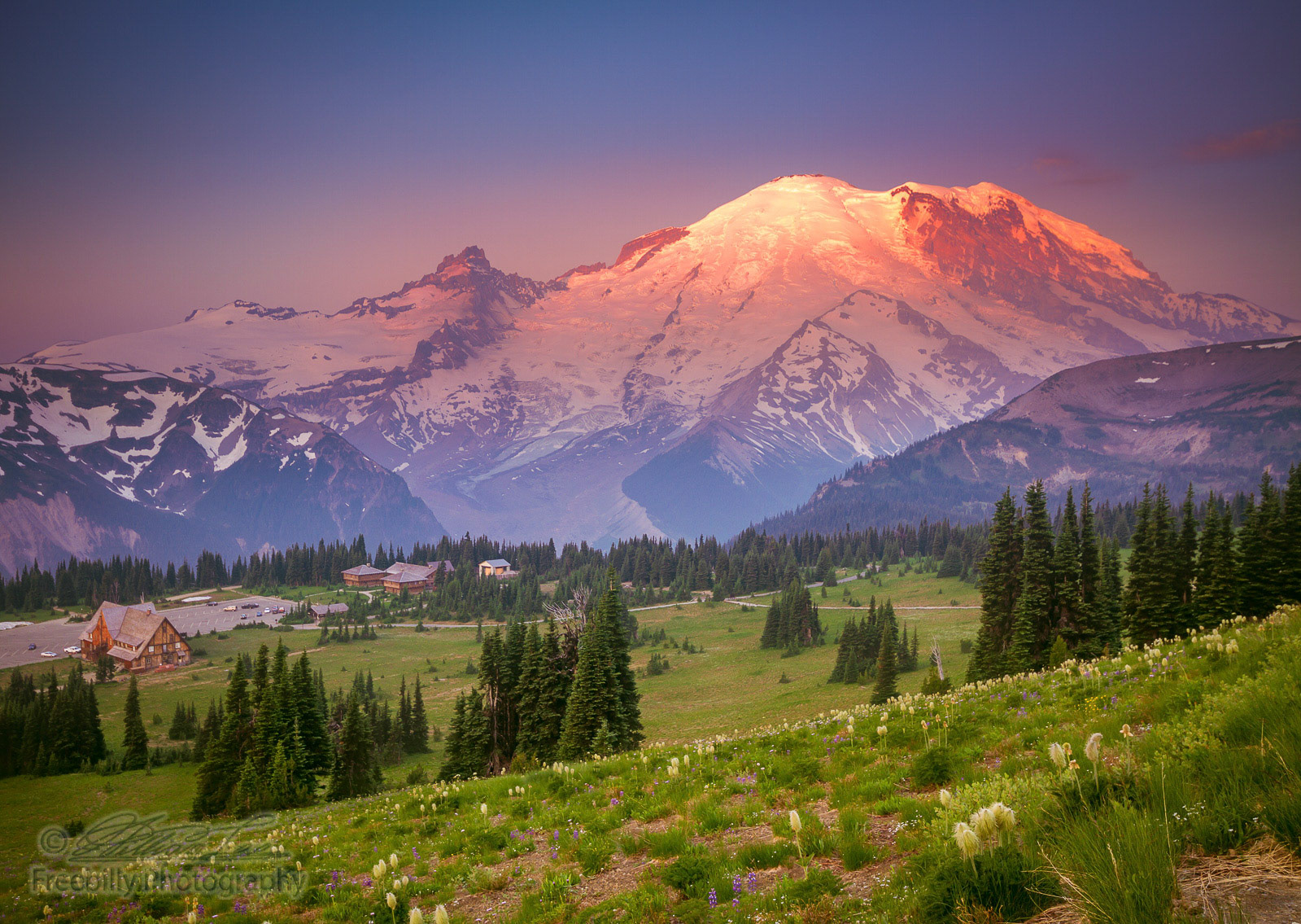 This is a photograph of Mt Rainier in sunrise lighting