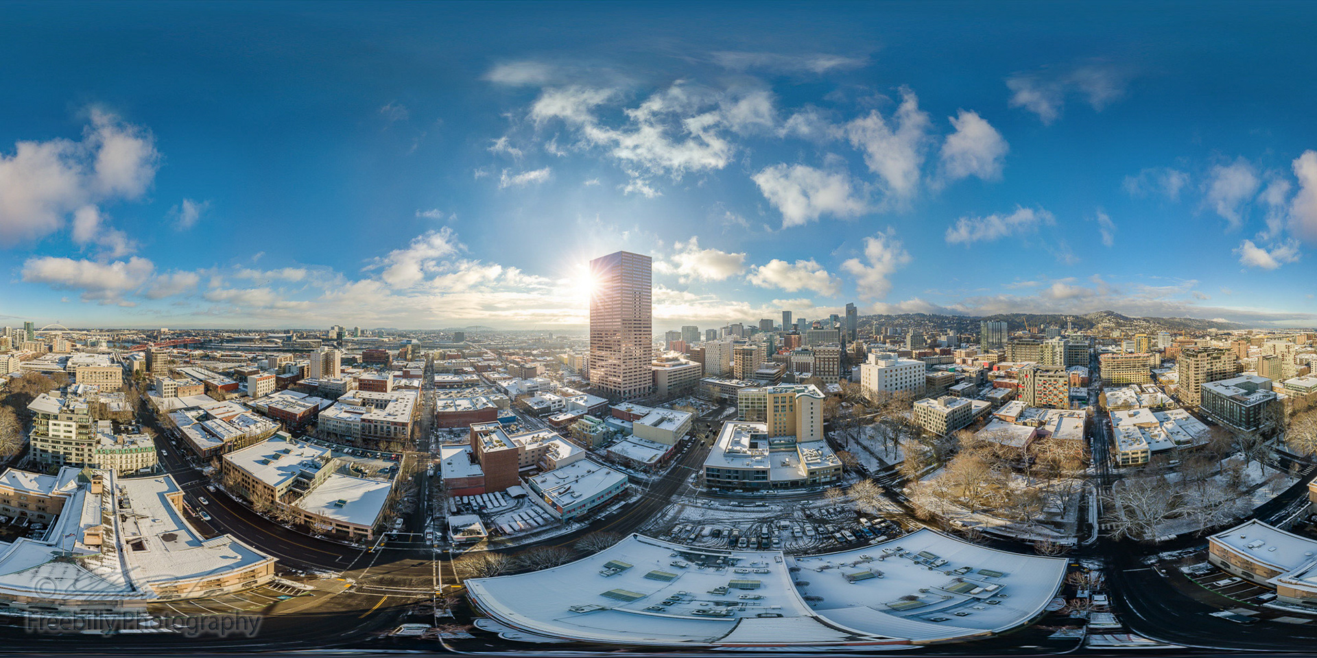 This is a full 360x180 aerial photosphere of the snowy morning at Pearl District, Portland, OR.