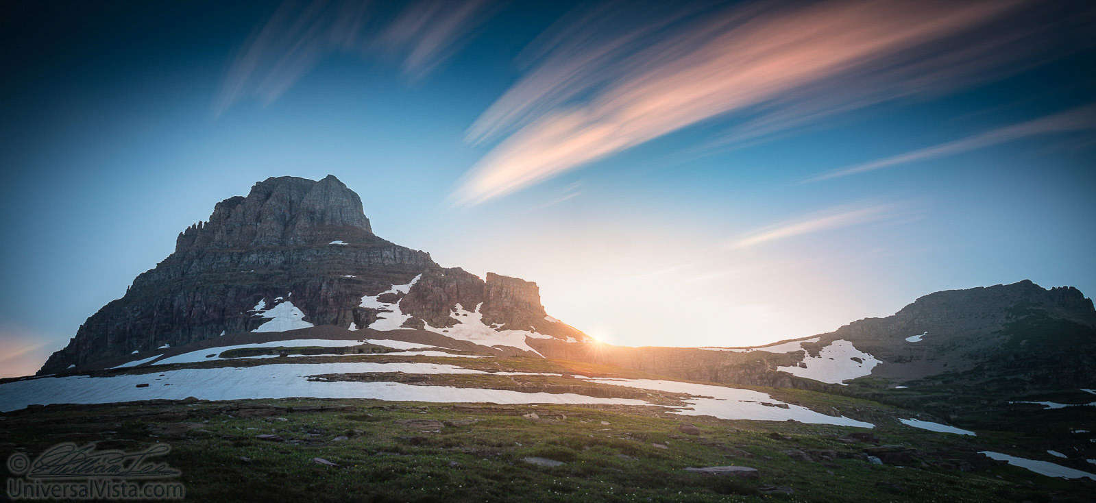 This is a panoramic long exposure of logan pass sunset.