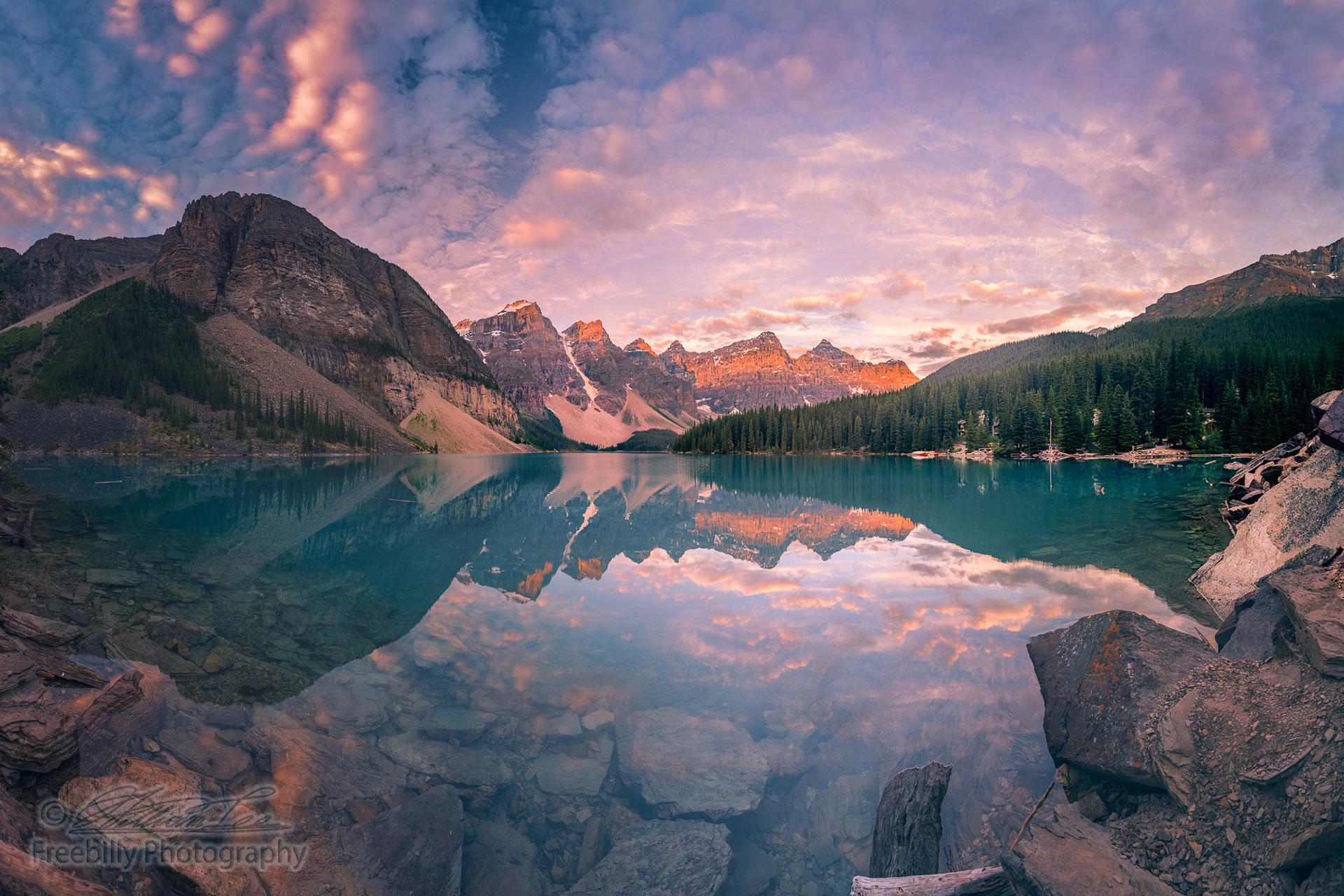 This is a super wide angle panorama of Moraine lake at Banff National Park, Canada.