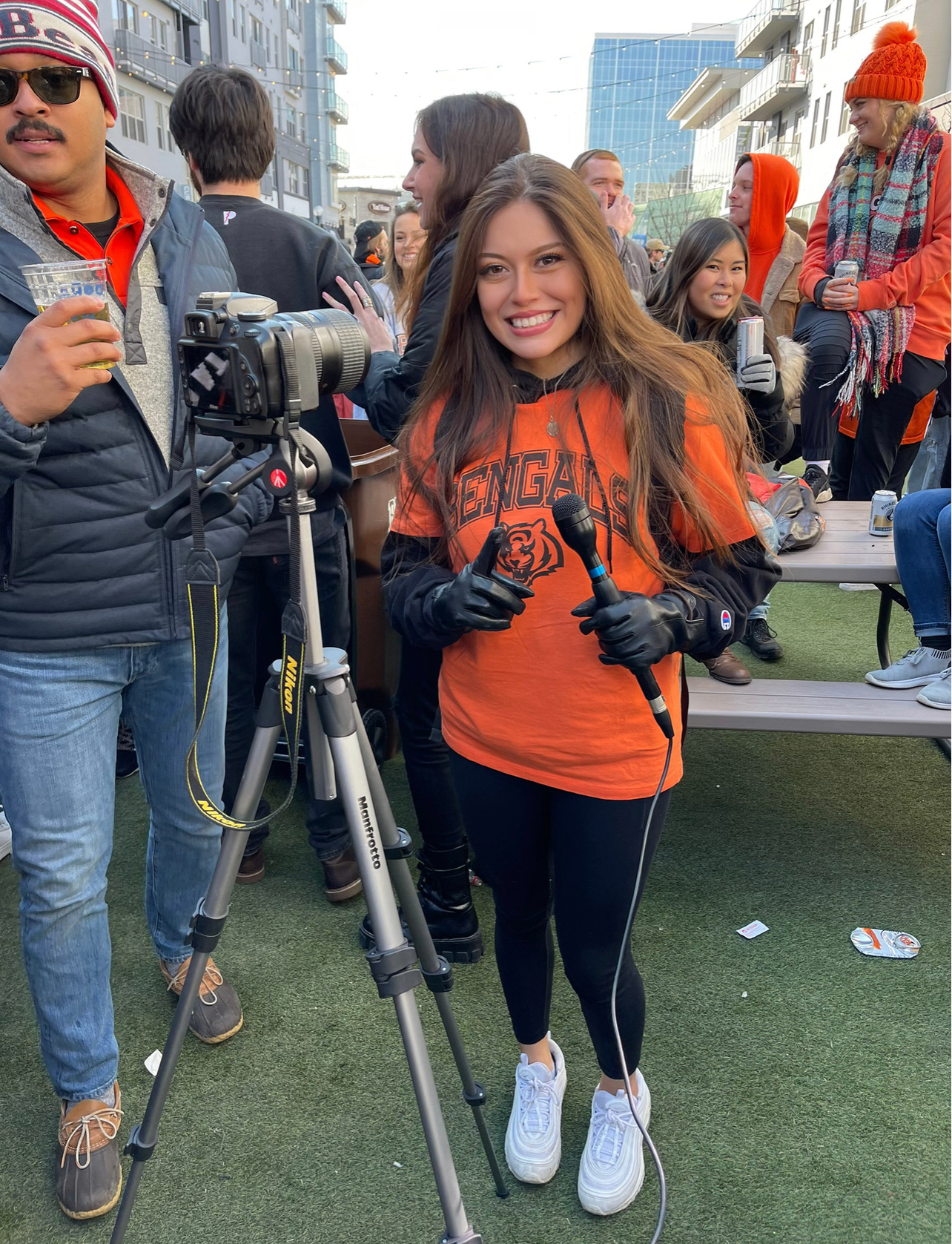 Reporter poses during Super Bowl in Cincinnati.