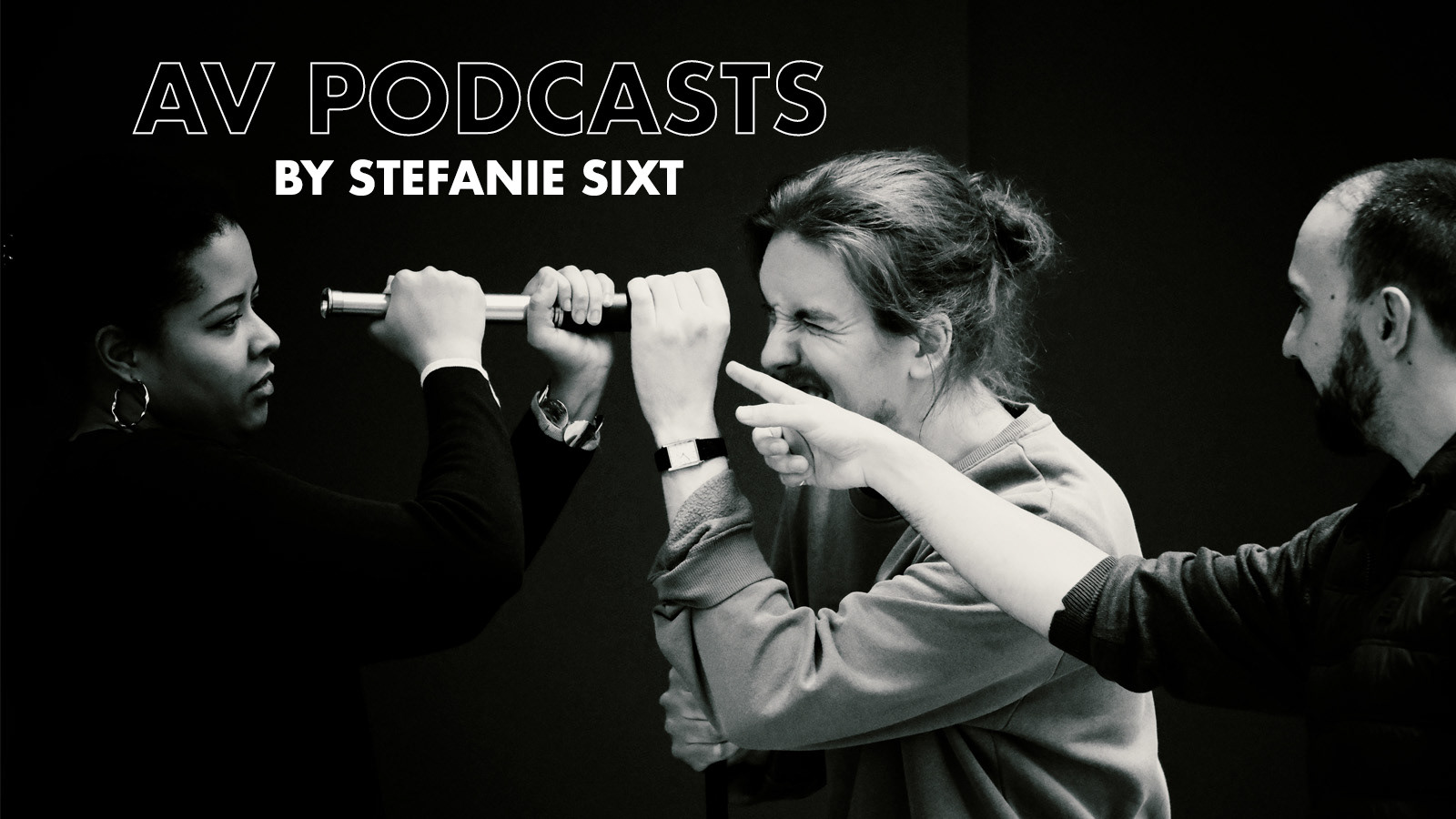 black and white photograph from an audiovisual podcast production by Stefanie Sixt — two performers in close interaction, produced for the Antonio Salieri Institut, mdw University for Music and Performing Arts Vienna. Category: AV Podcasts.