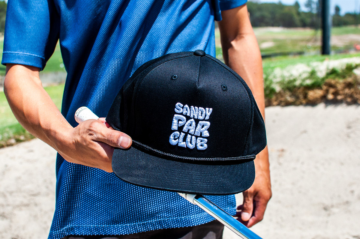 Sandy Par Club logo transposed on to a hat.