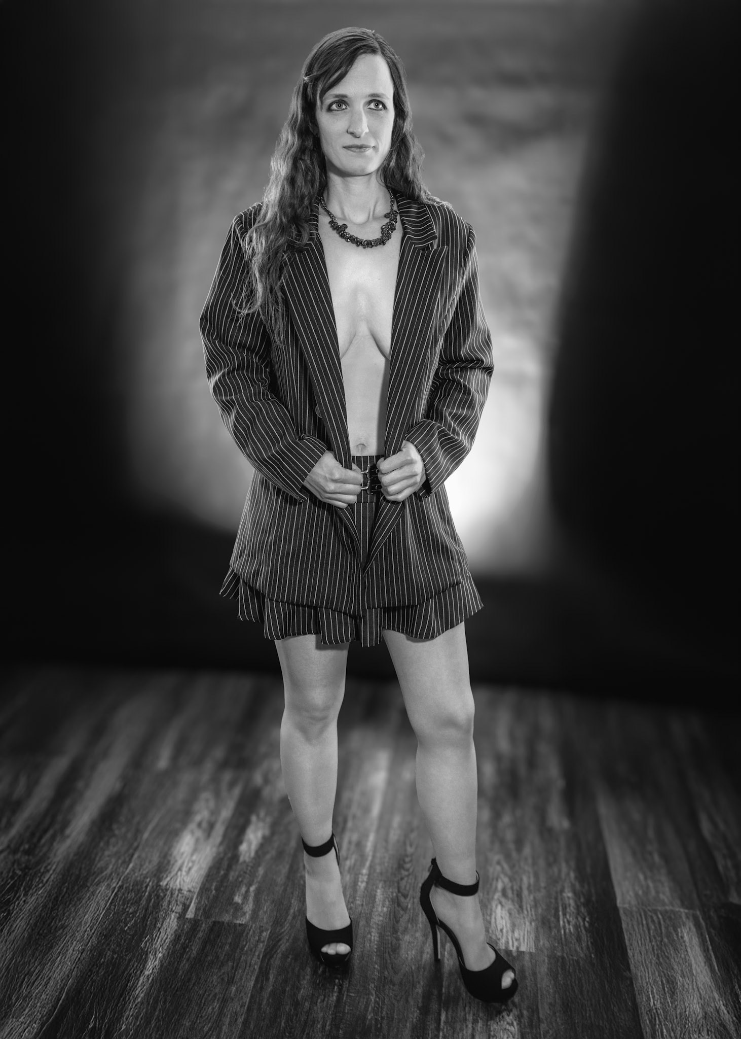 Short Skirt and a Long Jacket - Jacket Hold (B&amp;W): Cake themed shoot today, lit by the sides by Godox AD200 pros in 30x120 softboxes with yellow gel. Backlight lit by V1 with a blue gel. Main flash also a V1 with a grid and white cloth softener.