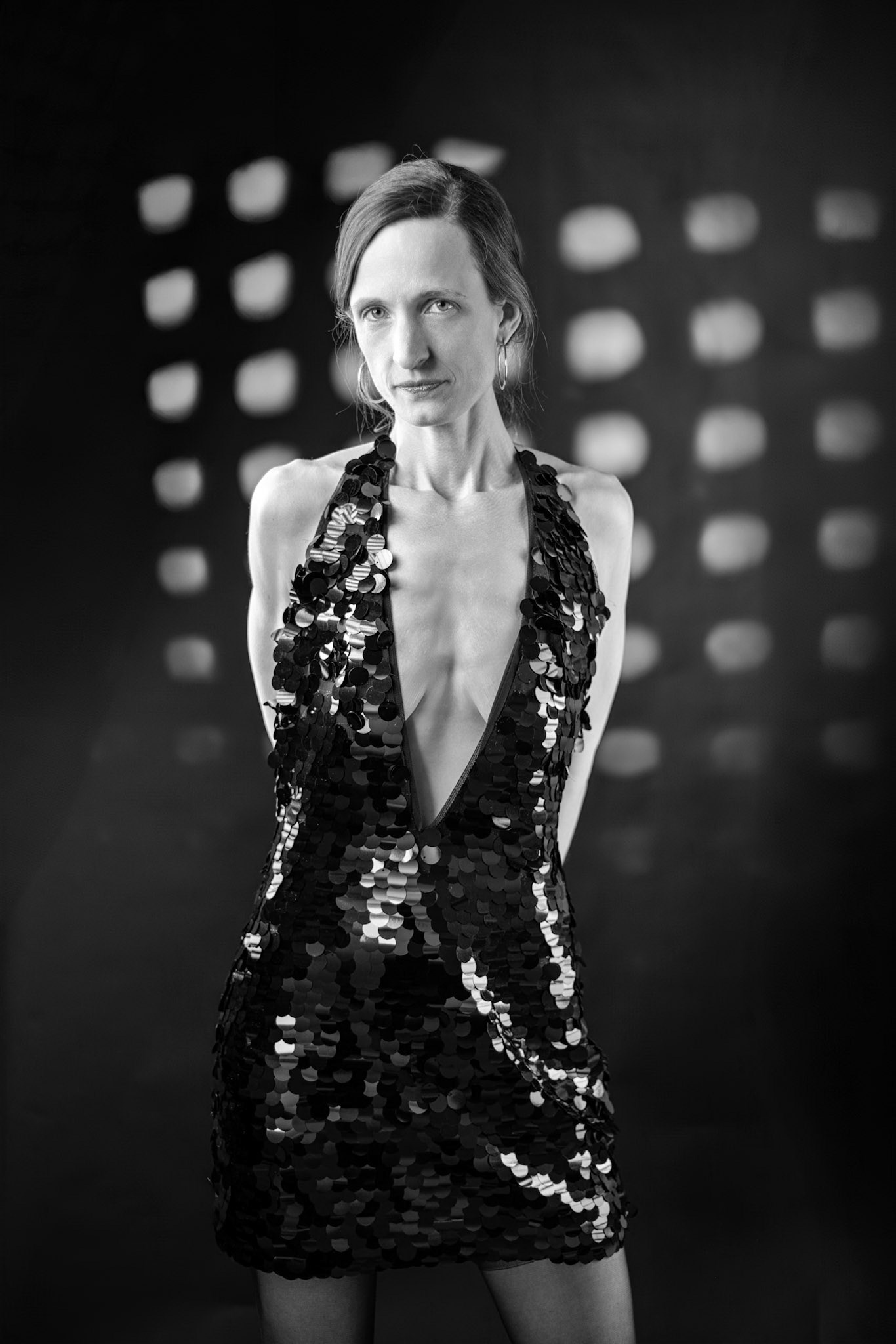 Midnight Edge: Sequins &amp; Steel - A stare that cuts through the lens. Fashion with bite.