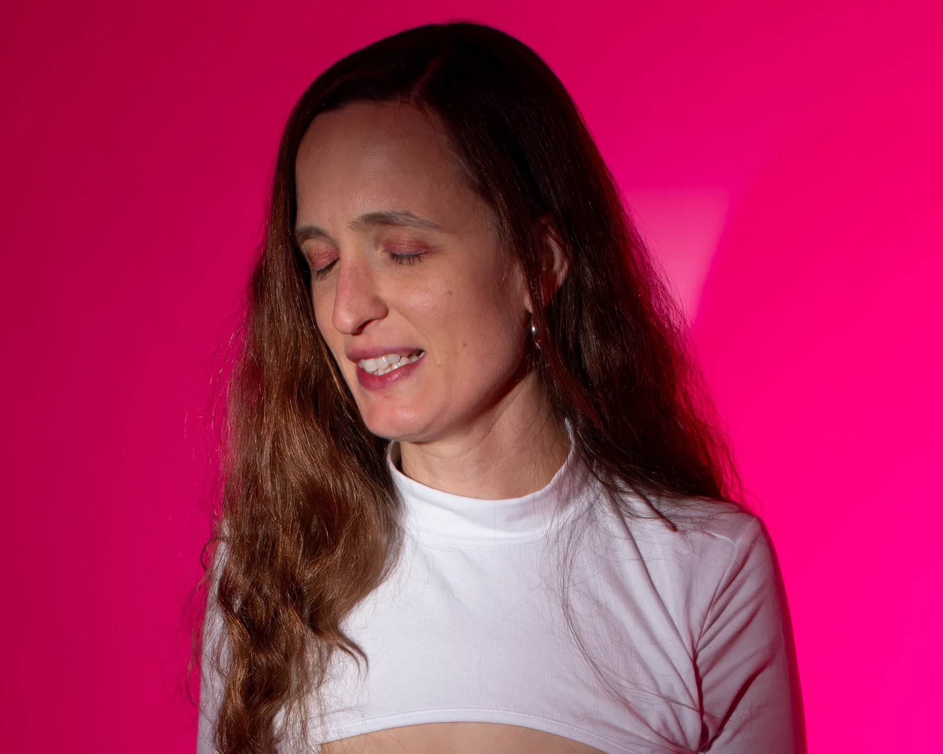 Super Heroine - Concentration: Trying out a basic superheroine costume. Godox v1 w/ snoot for face, v1 w/ 30x120cm for general, and AD200 w/ red gel for backdrop.