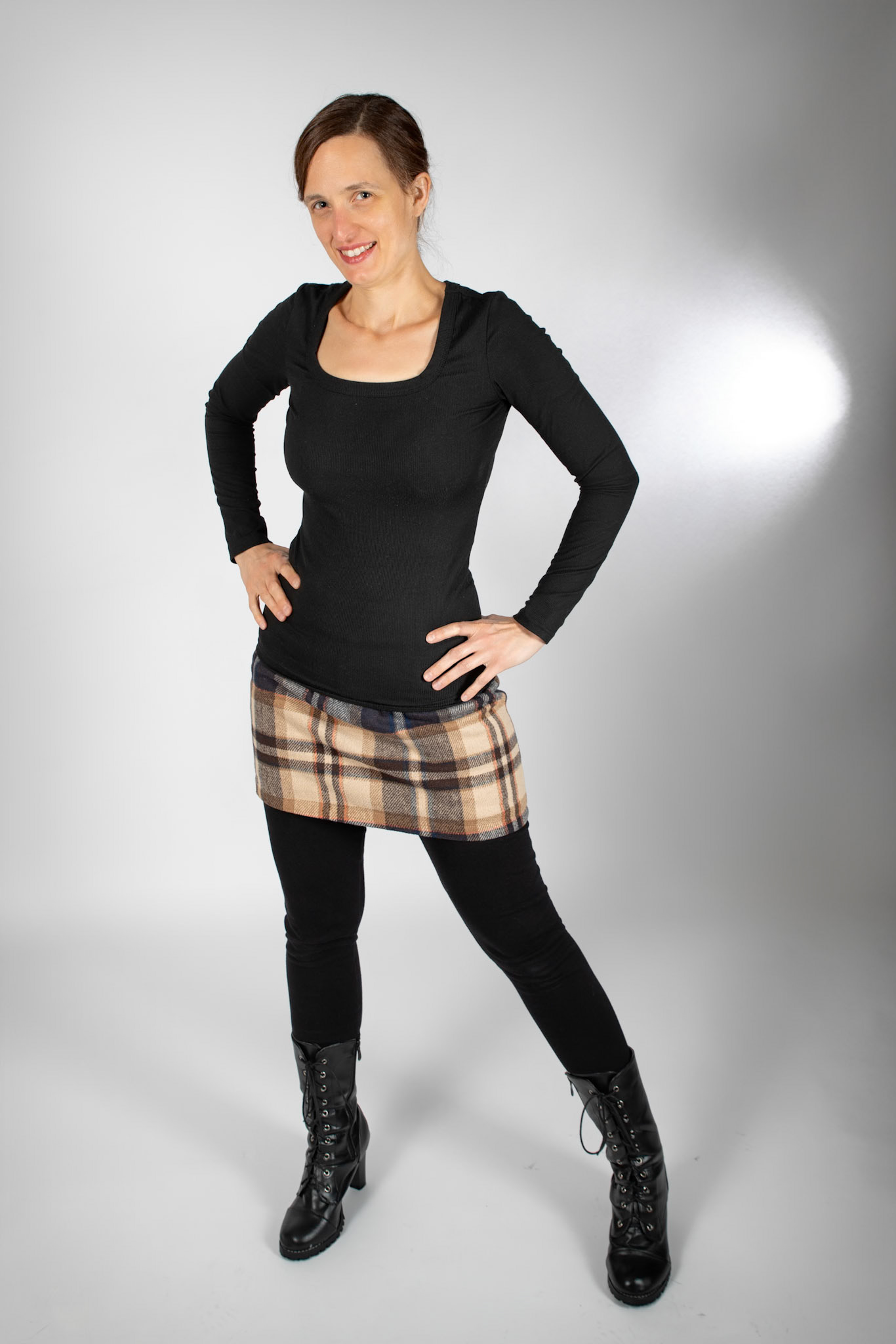 Black and Tan - Confidence: Godox V1 front left w/ white umbrella, front right in 30x120 softbox. Godox AD200 behind white seamless backdrop.