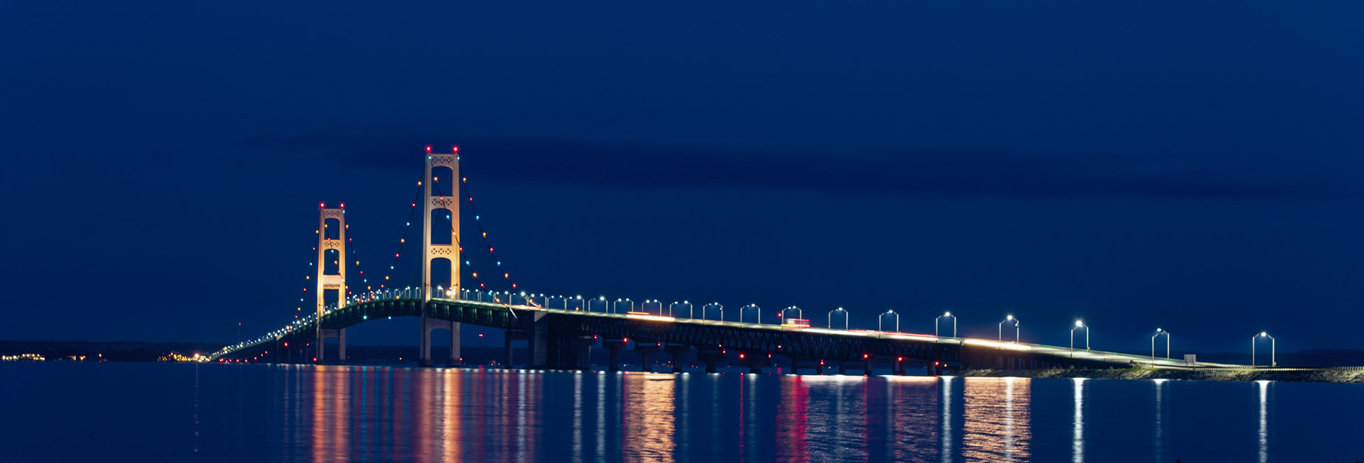 The Mighty Mac: Taking a couple shots of the bridge lit up at night, something I haven't really seen much of.