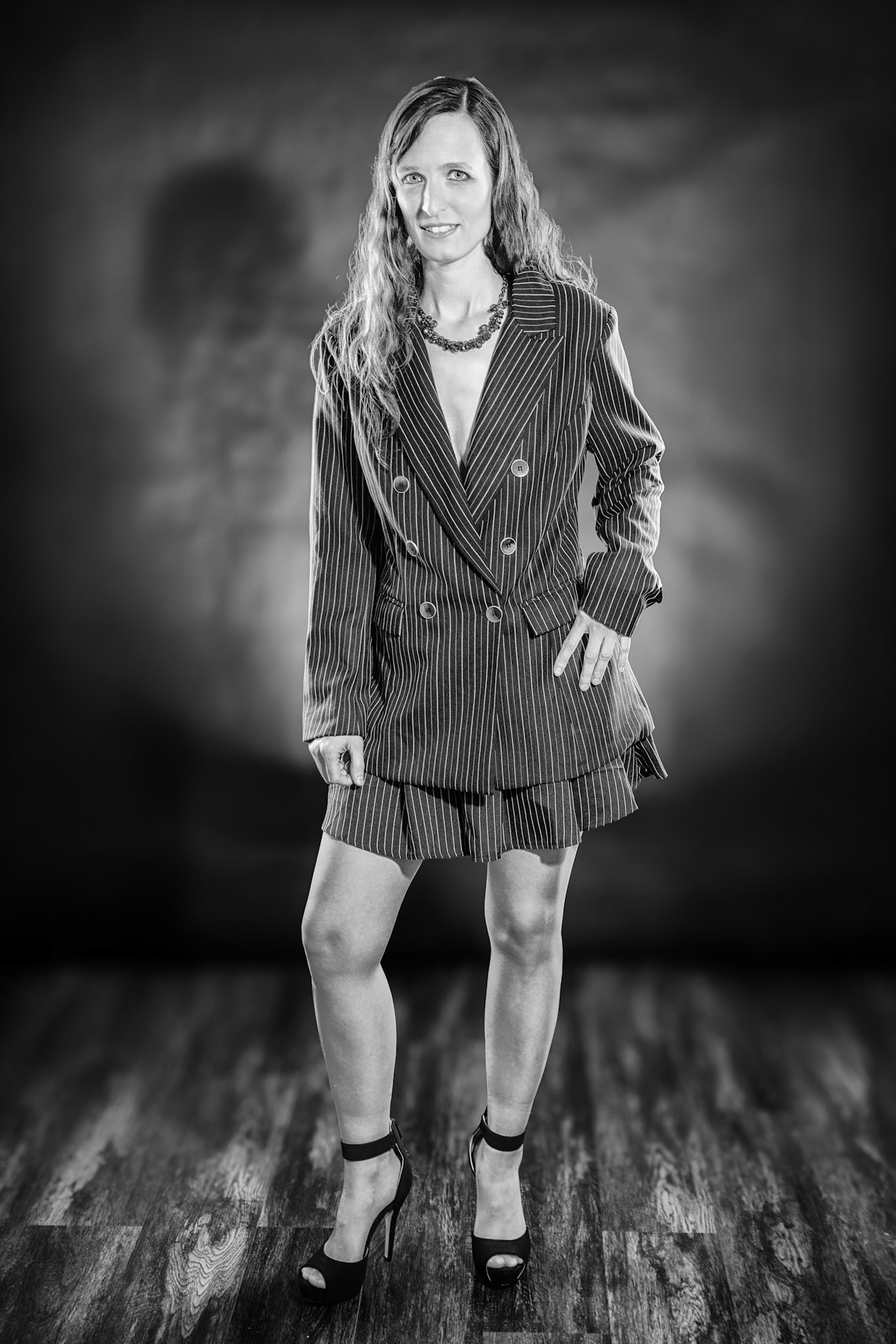 Short Skirt and a Long Jacket - Jacket Hold (B&amp;W): Cake themed shoot today, lit by the sides by Godox AD200 pros in 30x120 softboxes with yellow gel. Backlight lit by V1 with a blue gel. Main flash also a V1 with a grid and white cloth softener.