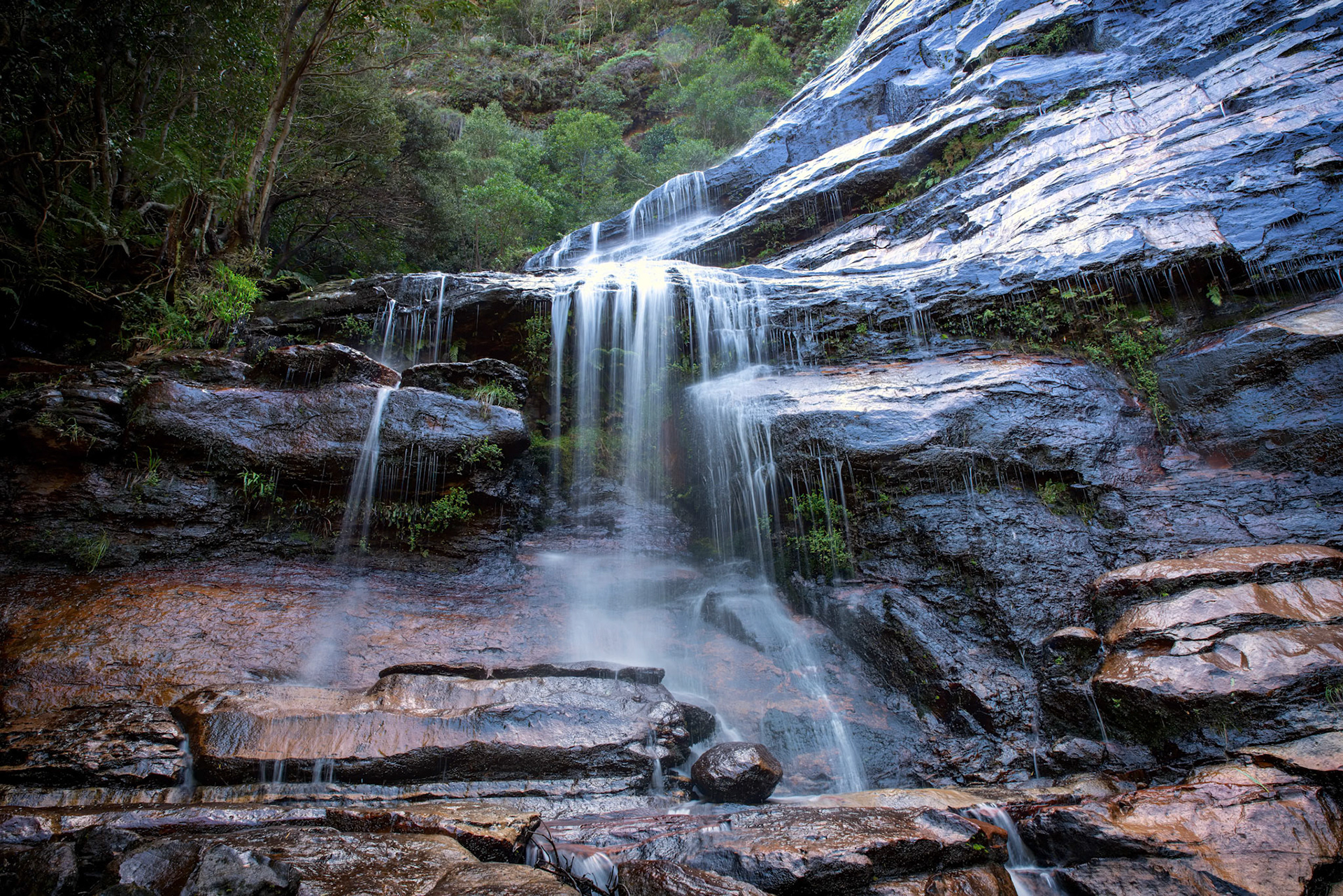 Leura Falls - Leura Falls in the Blue Mountains cascades a small amount of water over a massive fall, making for some glorious and difficult to photograph falls.