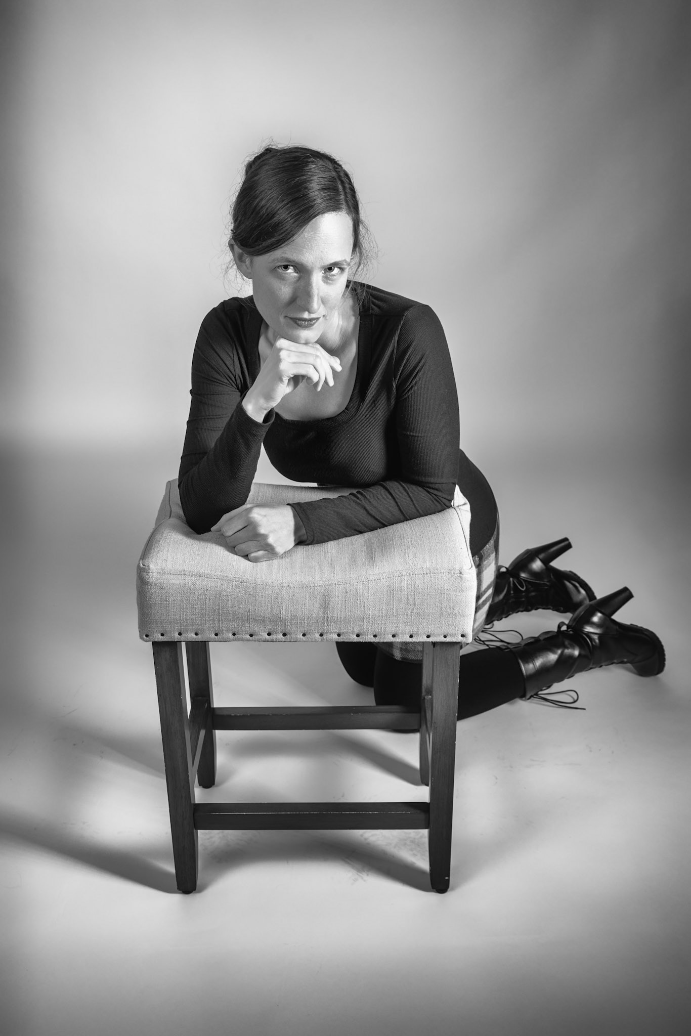 Black and Tan - Spotlight: Godox V1 front left w/ white umbrella, front right in 30x120 softbox. Godox AD200 behind white seamless backdrop.