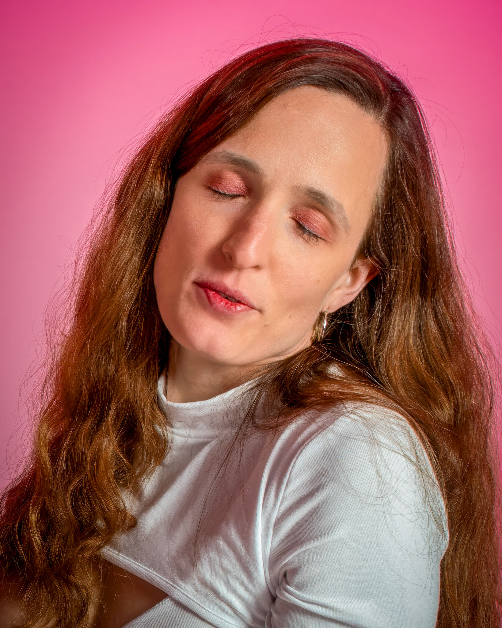 Super Heroine - Concentration: Trying out a basic superheroine costume. Godox v1 w/ snoot for face, v1 w/ 30x120cm for general, and AD200 w/ red gel for backdrop.