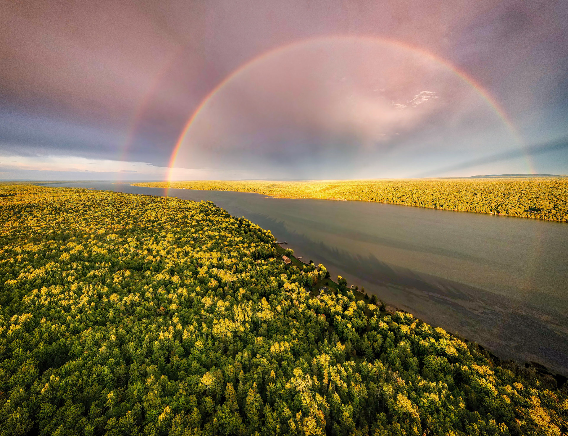Taking the drone for a shot of a rainbow over Huron Bay.