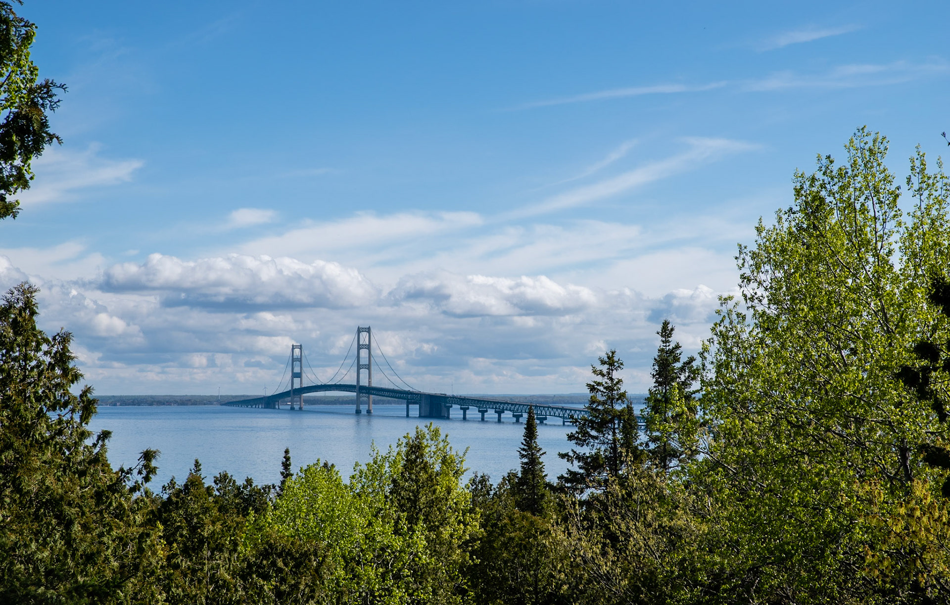 Framed by Forests: Nothing exemplifies the juxtiposition of the engineering marvel that is the Mackinac bridge against the rugged wilderness of the UP than this view from Straits State Park.