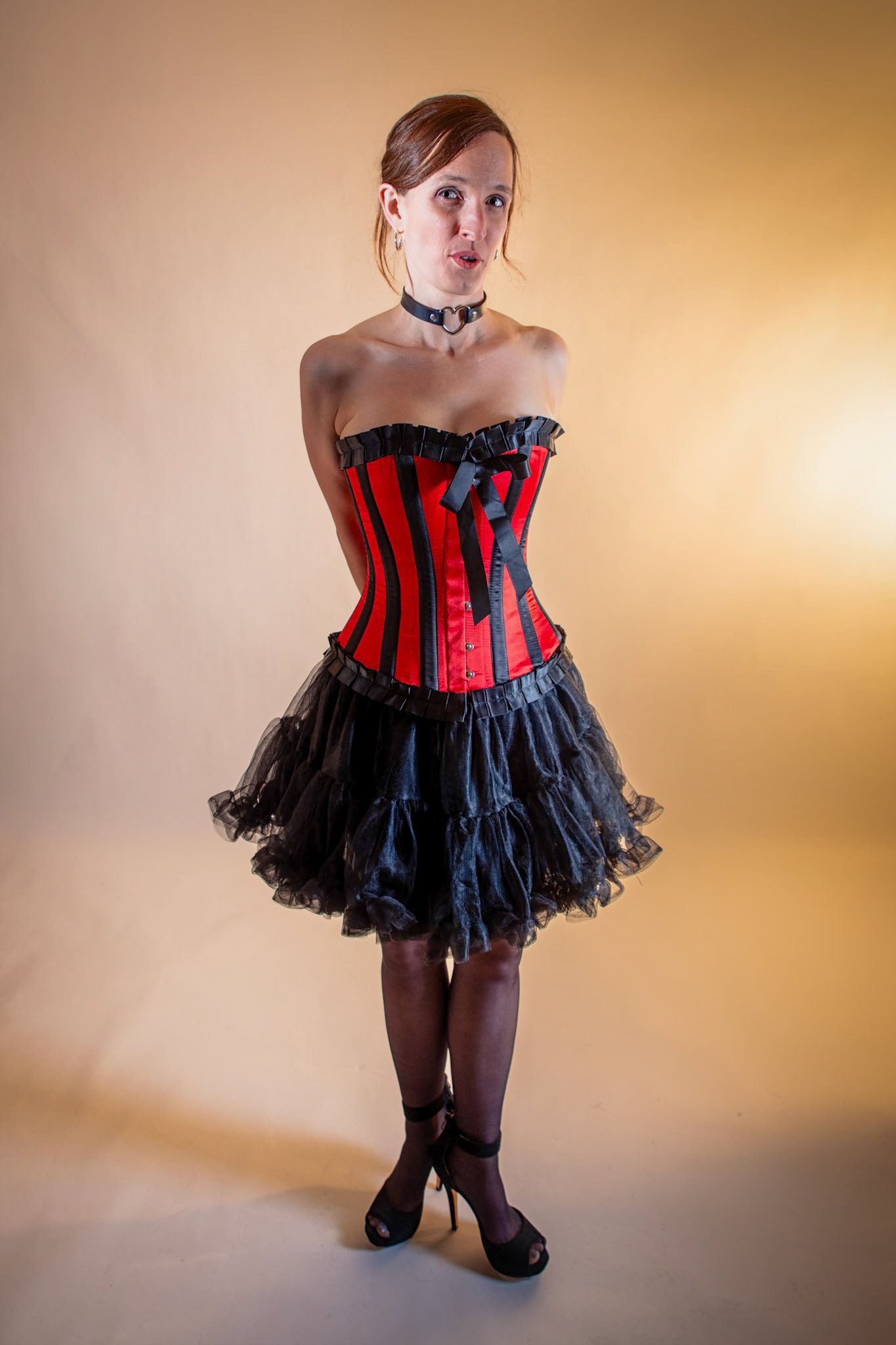 Western Corsetry - A Dangerous Game: The tension of a tightened lace and a look that promises everything while revealing nothing.