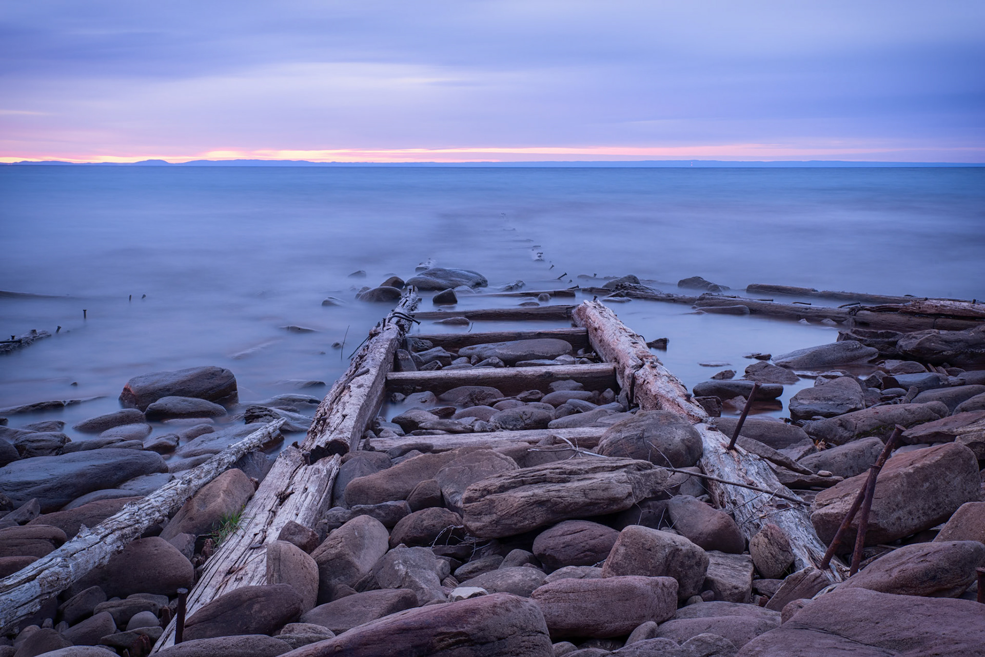 Mining Remnants at Tobacco River: Capturing the pre-dawn calmness of Lake Superior amidst the mining piers leftover.