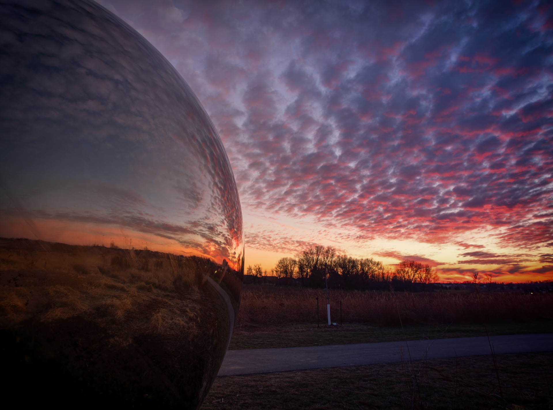 48:52 - Reflected Sunsets: After seeing a story about the installation of a new sculpture that included a giant silver ball, I knew what I needed to do. Capture a sunset against it!