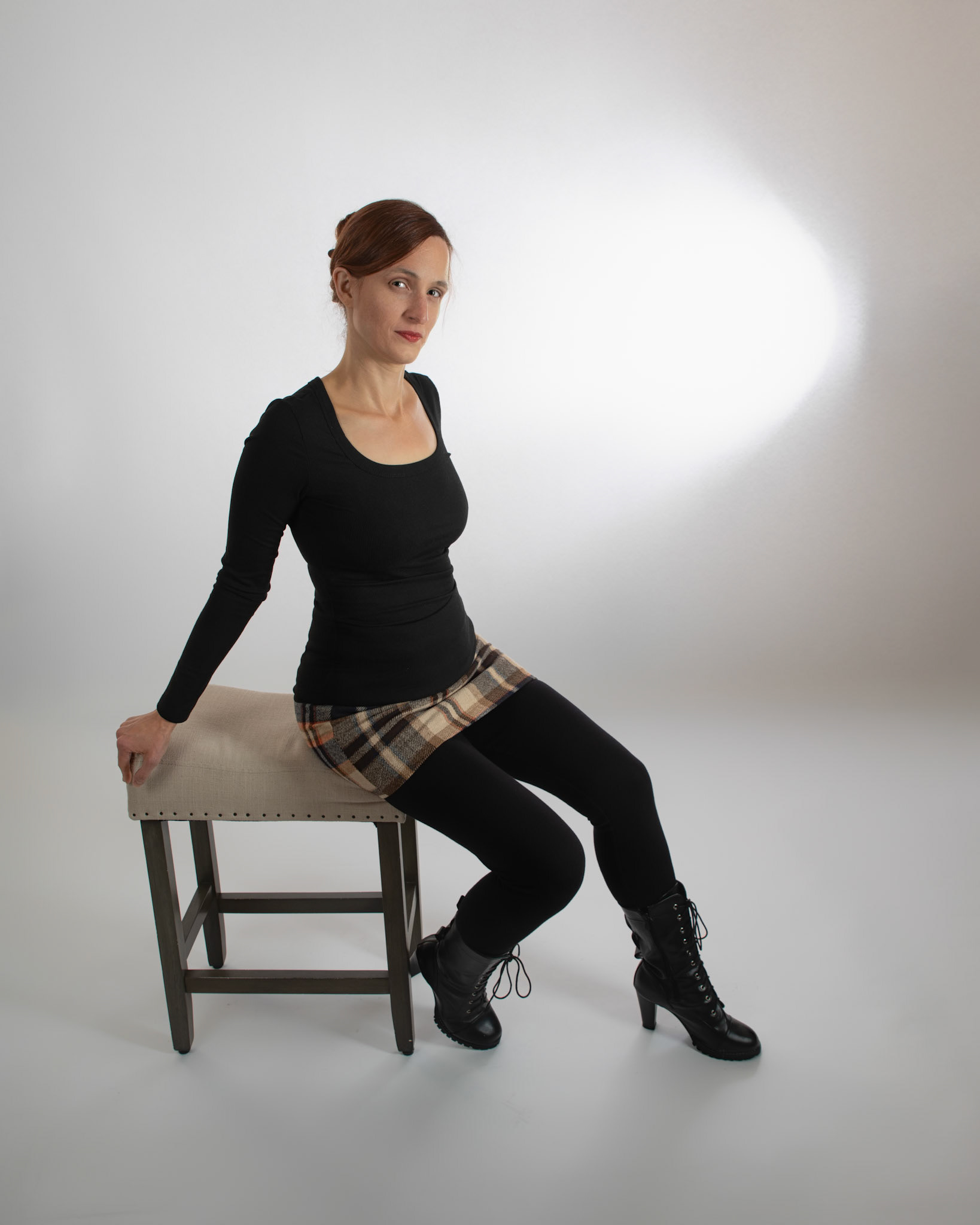 Black and Tan - Reclined: Godox V1 front left w/ white umbrella, front right in 30x120 softbox. Godox AD200 behind white seamless backdrop.