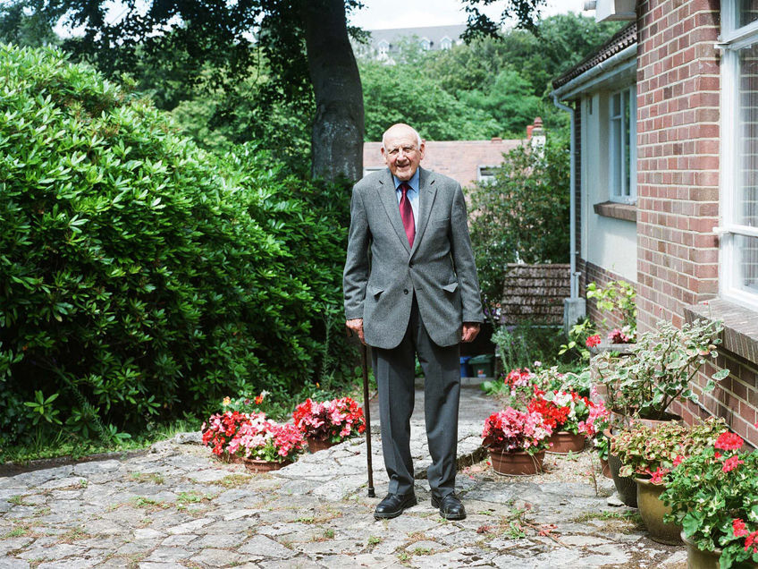 Former prisoner and survivor of the railway camps, photographed outside his home in Poole at the age of 97. After returning home from the Far East, Bob wanted nothing more than a simple life with his family in a comfortable home; he has lived in this house since his return and laid this paving himself. Speaking on survival, Bob recounted the memory of being sent to the makeshift hospital hut within the camp during a particularly vicious bout of illness. As cholera was rife, acute cases were isolated and Bob soon realised the severity of his situation. Determined to remain positive, he awoke the next morning from his delirium to find himself the only man of 20 that had survived the night. Surrounded by such devastation, this episode marked a distinct change in his attitude to survival; one of psychological endurance as much as physical.