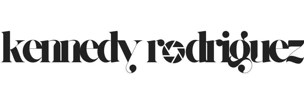 Kennedy Rodriguez logo with camera lens.