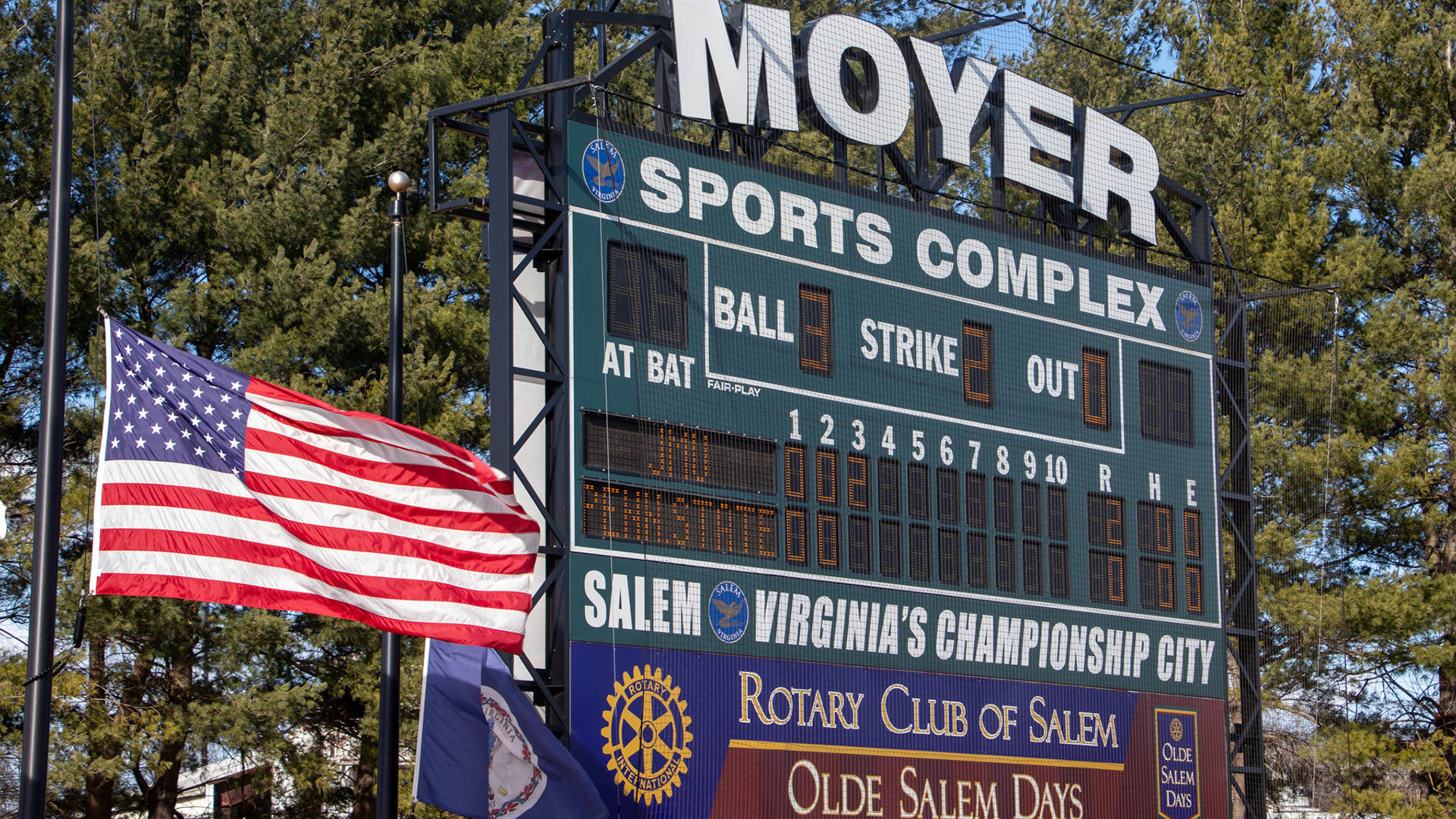 SALEM, Va., March 1, 2025 — Scoreboard: An American flag blows in front of the Moyer Sports Complex’s scoreboard, revealing James Madison’s 2-0 lead over Penn State. Photo: Sam Mostow