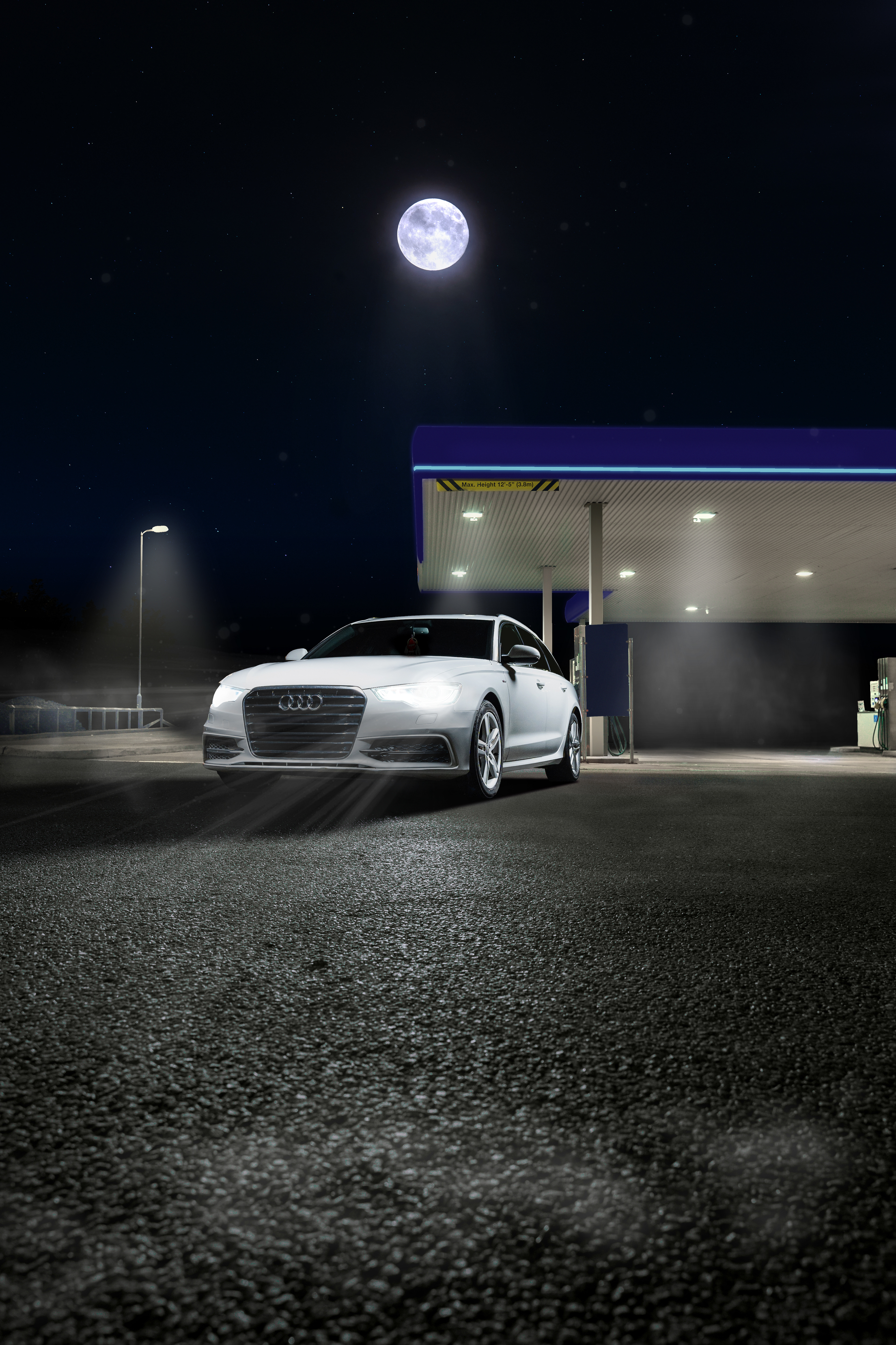 Precision technical car retouching of a silver Audi A6 Avant in a high-contrast night setting. Expert reflection smoothing and detail refinement for professional commercial automotive portfolios. Work by Tenyo Barbolski of Arcane Media