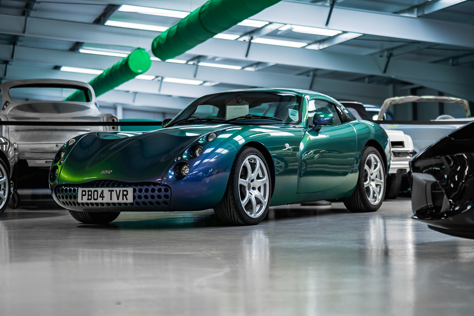 Chameleon green and blue colour of TVR Sagaris into showroom display settings
