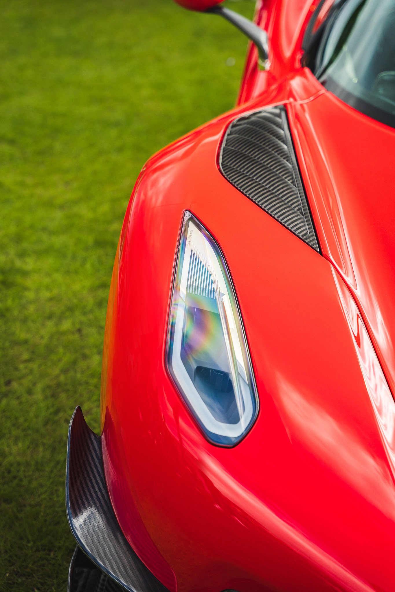 Close-up of Koennigsegg Jesko Time Attack Headlight and wing with carbon fibre details