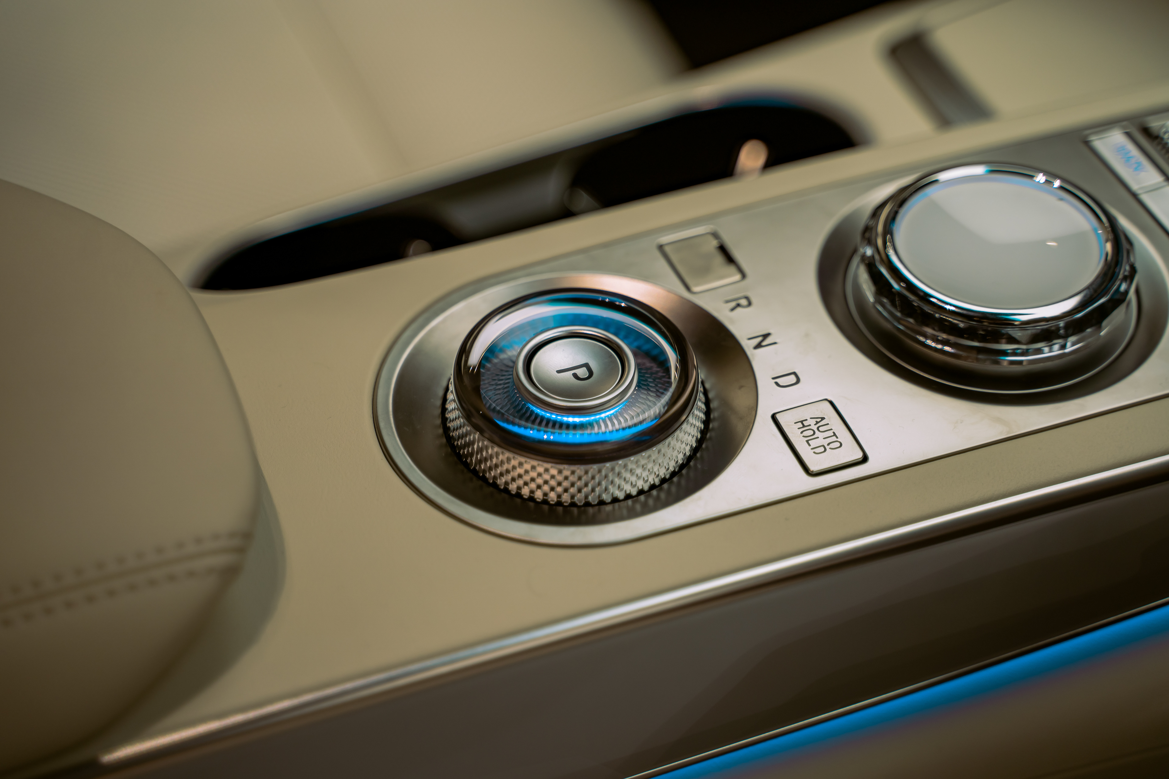 Close-up of Genesis interior controls with premium materials and textures