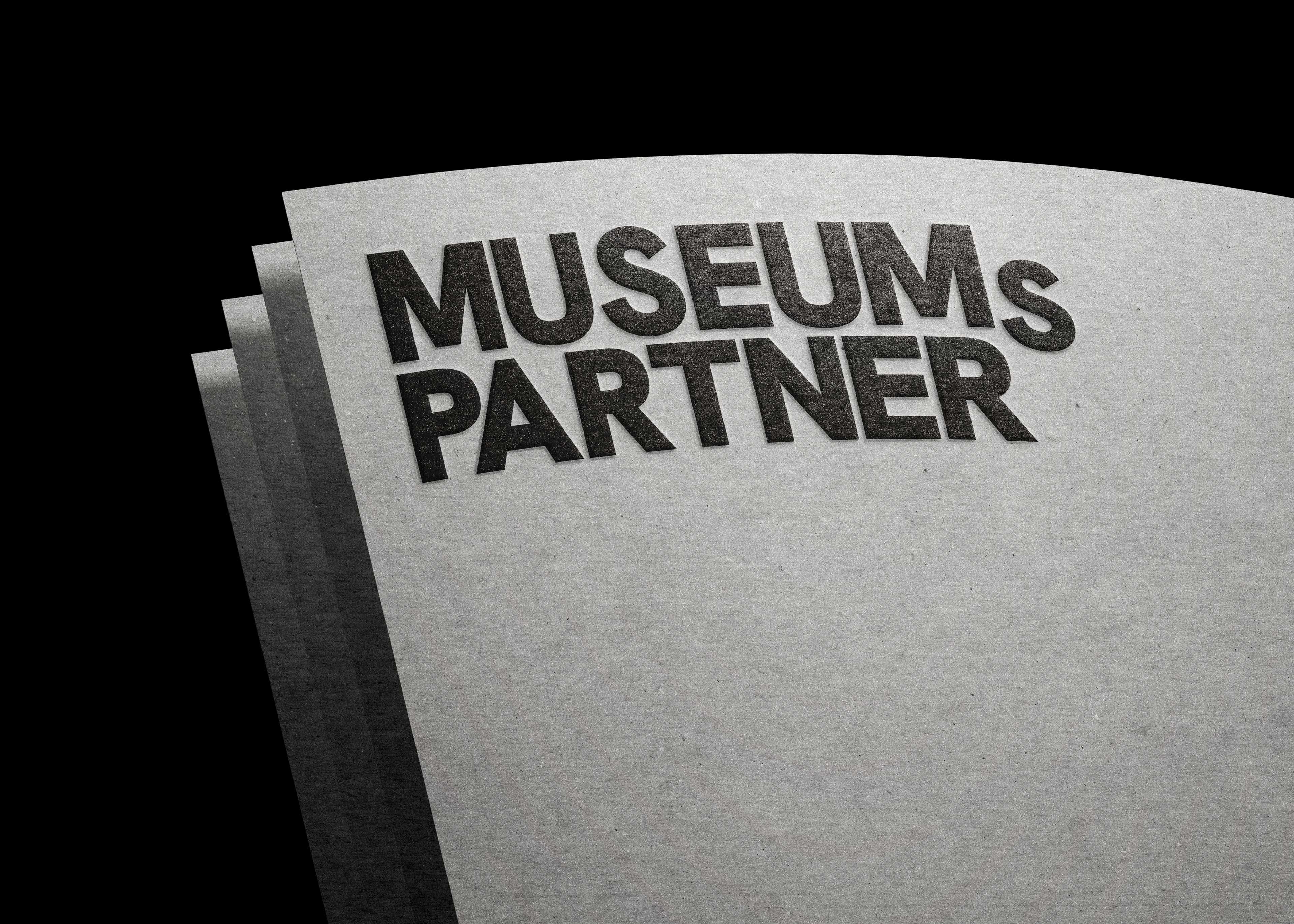Museumspartner wordmark design embossed on paper