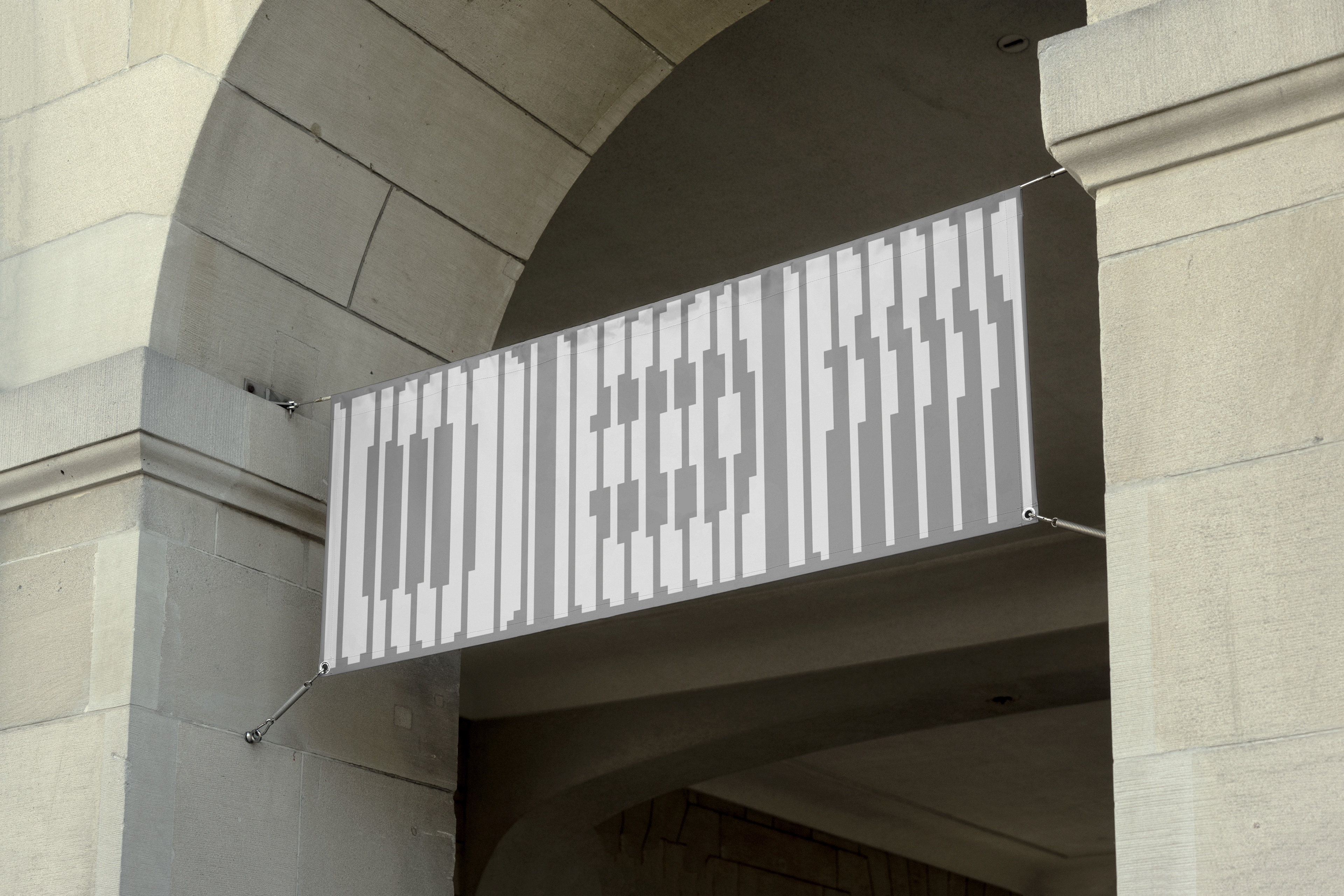 Museum entrance identity for an Audi corporate exhibition, using high-impact visual branding to create an immersive welcome experience.